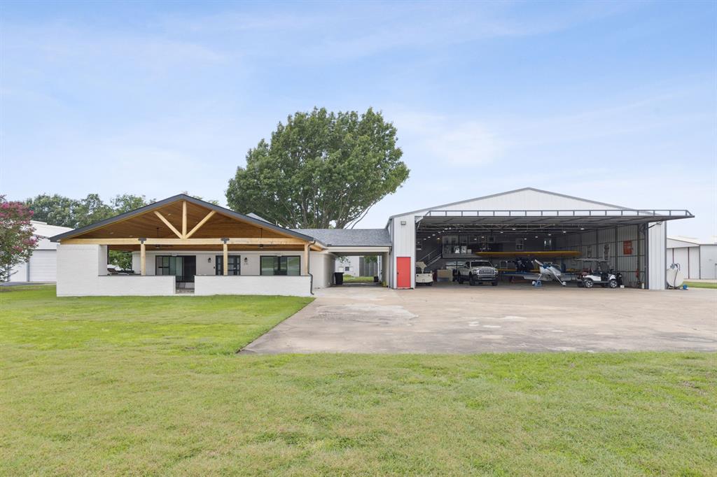 Live, fly, and invest in one of North Texas’ most sought-after aviation communities — Aero Country Airport (T31). This prime 1.32-acre property offers direct taxiway and runway access, two large hangars, full pilot accommodations, and incredible potential for residential or aviation-based redevelopment.1.32-acre lot with direct access to taxiway and runway; Two large aircraft hangars with hydraulic bi-fold doors; 60' x 50' hangar; 60' x 60' hangar; First Floor Pilot's Lounge: Approx. 1,200 SF; Full kitchen; Full bath – perfect for long days on the field or entertaining fellow aviators; Second Floor Private Quarters:Approx. 1,200 SF; 2 bedrooms and 2.5 baths; Spacious living area, full kitchen, and two walk-in closets; Ideal for full-time residency, weekend escapes, or guest accommodations. Additional Structure on Site: 1,600 SF brick home with composition roof (home sustained fire, smoke, and water damage) - option to renovate, remove, or rebuild to suit your vision. Property positioned at the north end of the runway – one of Aero Country’s most desirable locations; Located in Prosper ISD — a top-rated school district; Minutes to McKinney, Frisco, Prosper, and North Dallas. Ideal for: Aviation families or private pilots seeking fly-in and fly-out living; Aircraft collectors along with your other toys such as RV, collector cars, boat, motorcycles, etc; Investors or developers looking for a high-potential aviation asset; Anyone looking to be part of the close-knit Aero Country Airport community.
