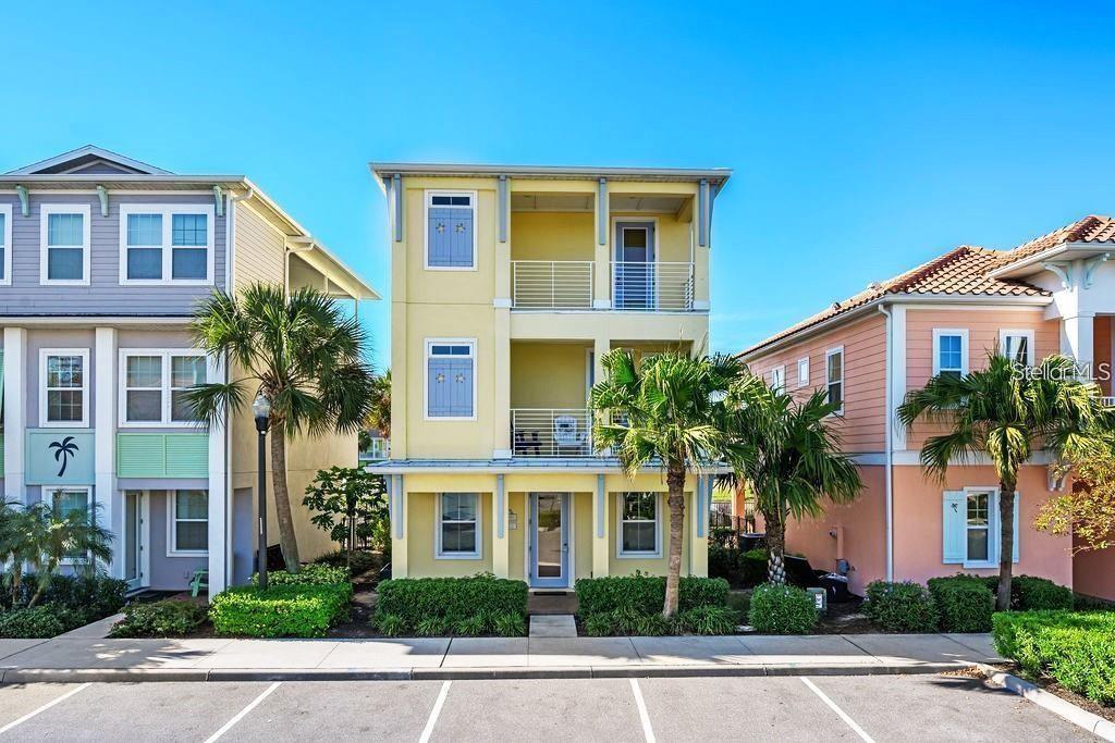 BRAND NEW AC with 10 YEAR TRANSFERABLE WARRANTY! 5.99 INTEREST RATE for qualified buyers who use our preferred lender! PHASE 1 WATERFRONT 4 bedroom cottage in the heart of Margaritaville Resort located just 5 minutes from Disney! Just steps from the resort amenity area, this immaculately kept cottage is fully equip with Margaritaville Resort approved furnishings by Ethan Allen. This spacious open floorplan home has 4 bedrooms, all with their own en suite bathrooms and separate thermostats for each level, along with high end wood look tile, quartz countertops, wooden stairs, private owners closet, high ceilings, multiple private balconies, an outdoor shower, and so much more! The large fenced in patio features a private, heated pool, ample eating and entertaining space, and sweeping lagoon views. This property can be used as a full time residence, second home, or short term rental property. This resort style community features two large swimming pools, multiple restaurants and bars, fitness center, full service spa, lush and tranquil walking trails to all ends of the community, as well as a moments walk to all of the restaurants, bars, shops and entertainment that Sunset Walk has Low maintenance resort living includes fully maintained grounds, home exterior, lawn care, and 24/7 roaming security.