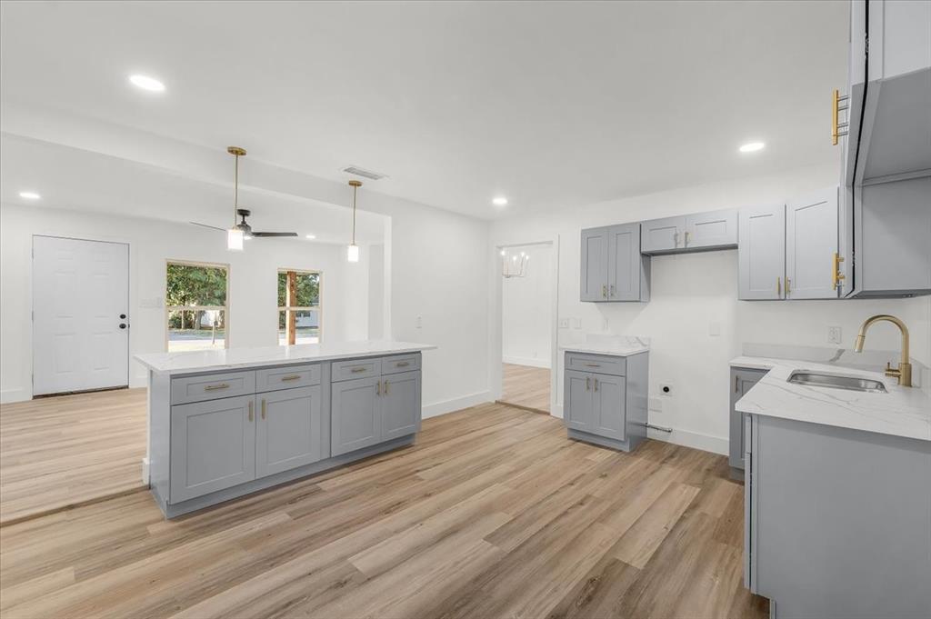 Beautifully remodeled with a thoughtful layout ready for move in! Enjoy this gorgeous 3 bed 2 bath home with lots of living space and ample kitchen space. This home has its designated dining area and living area with extra room to make it to your liking. Have a peaceful mind with all of these new items: NEW HVAC, NEW ROOF, NEW WATER HEATER, NEW FLOORING, NEW QUARTZ, NEW CABINETS, NEW WINDOWS, NEW RESTROOMS! You don't want to miss your chance to see it in person!