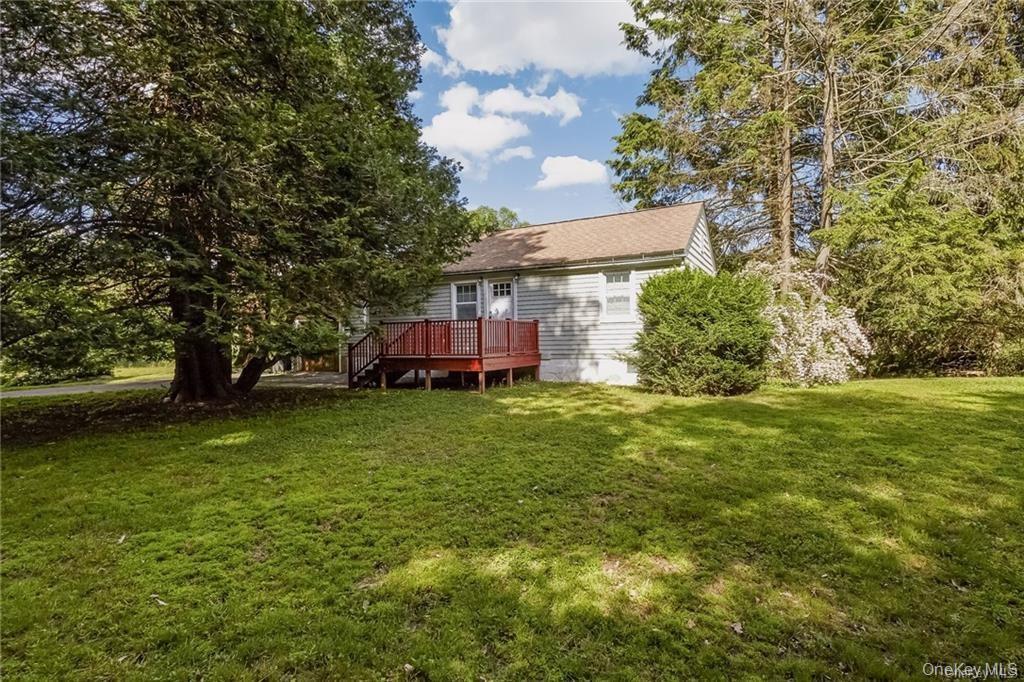 This charming cottage has been completely reimagined, seamlessly blending timeless character with modern luxury. Fully gut-renovated and thoughtfully redesigned from top to bottom, this inviting home offers the perfect retreat—whether you're seeking a serene weekend escape or a full-time residence.
Ideally located just minutes from downtown Chappaqua and seconds from Chappaqua Crossing, Horace Greeley High School, and Whippoorwill Park, the convenience is unmatched.
Inside, the sun-drenched interior features an open layout with high-end finishes throughout. The custom kitchen (2018) is outfitted with sleek appliances and tailored cabinetry, while the beautifully updated bathrooms exude style and sophistication. Cozy living spaces and gorgeous hardwood floors enhance the home’s warmth and character. Every detail has been carefully curated, including updated systems and new windows, all while preserving the home’s original charm.
