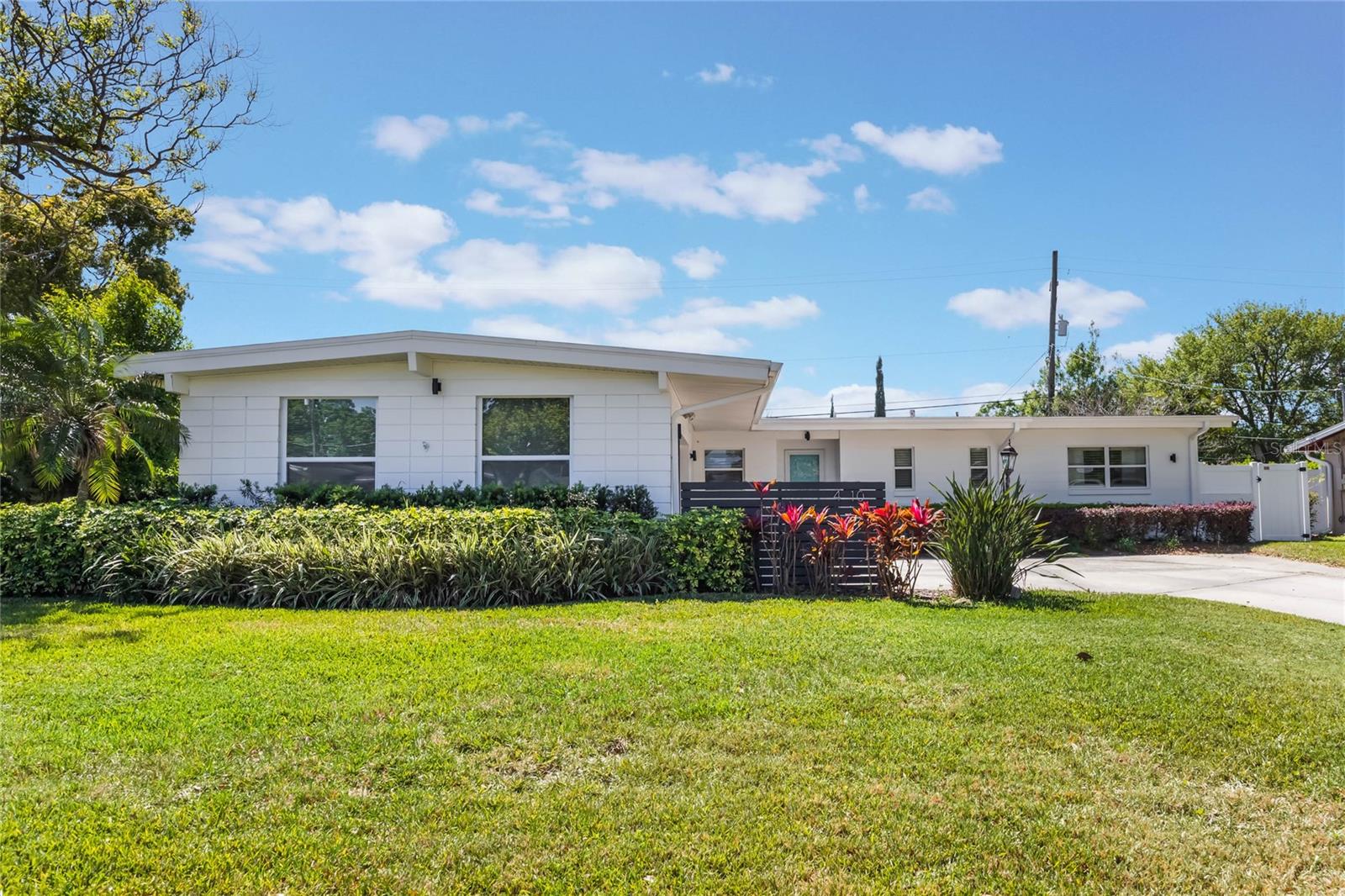 Welcome to refined living in the heart of Dover Shores East! This beautifully maintained 3-bedroom, 2-bathroom pool home offers the perfect blend of comfort and convenience. Inside, you'll find a modern kitchen with stainless steel appliances, granite countertops, and ample cabinet space, along with elegant wood-look laminate flooring throughout. The spacious bedrooms include a primary bedroom with an en-suite and walk-in closet, and every room is equipped with ceiling fans for added comfort. Enjoy the Florida lifestyle with a fully fenced backyard, a sparkling pool, a fire pit, and a covered patio, perfect for outdoor relaxation and entertaining. The home also features a large laundry room with additional cabinetry and storage, and a two-car garage for added convenience. Centrally located, this home is just minutes from Orlando International Airport, Downtown Orlando, and offers easy access to major highways, making commuting a breeze. A/C - 2014, Water heater - 2014, Roof - 2019, partial replumb - 2014, electrical - 2014,  Pool resurface & tile est. 2017, pool pump - est. 2022.
