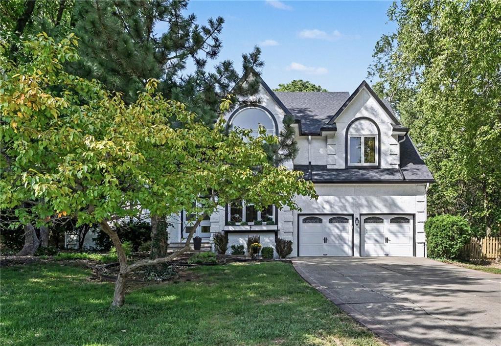 Large 1.5 story home with private back yard and next door to community park space. Primary suite on main level with newly remodeled bath and sitting area. 3 generous sized bedrooms all with private bath access on 2nd floor. The kitchen has an abundance of granite counter surface and looks out over the peaceful backyard. You will love the architectural details in this home! The basement is finished with a full bath and 2 living spaces, plus plenty of storage. Newer roof, newer HVAC and many improvements recently made to be ready for the next owner! Grab this opportunity to live in Weatherby Lake!