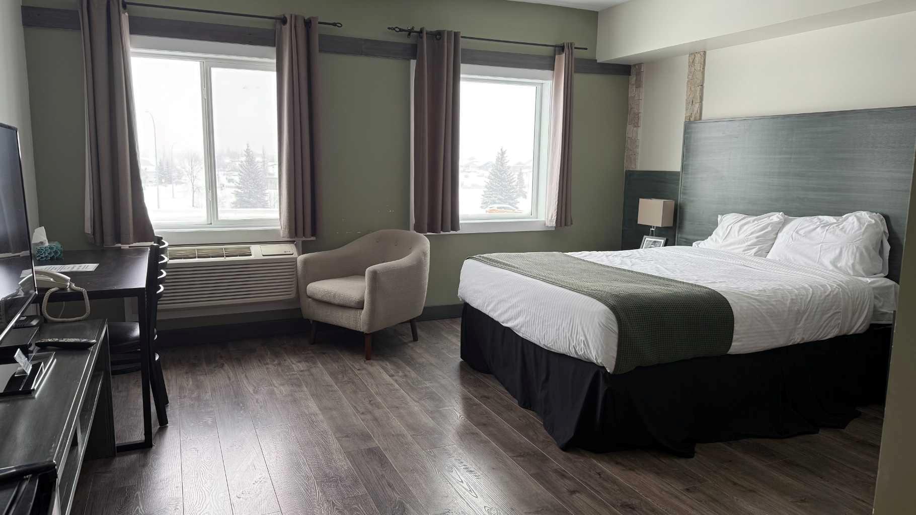 Prime income-generating property offered at $4.3 M, featuring 32 GUEST ROOMS, 21 VLTs, a FULL-SERVICE BAR, LIQUOR STORE, and TWO LEASED RESTAURANT spaces. This well-established operation delivers approximately $2M in ANNUAL REVENUE, with multiple diversified income streams.Recent upgrades include approximately $2 MILLION IN RENOVATIONS (2020), with significant improvements to guest rooms including NEW WASHROOM AND SEPARATE HAVC SYSTEMS, enhancing operational efficiency and guest experience. Situated on 0.6 acres, the building spans 25,392 sq. ft., including a 11,377 sq. ft. main floor and 6,587 sq. ft. basement, allowing for efficient operations and future potential.Owned and successfully operated by the same owner for over 20 years, this is a rare, stable, and profitable investment with proven performance.An ideal opportunity for investors seeking a high-cash-flow asset with diversified revenue streams and strong upside potential.