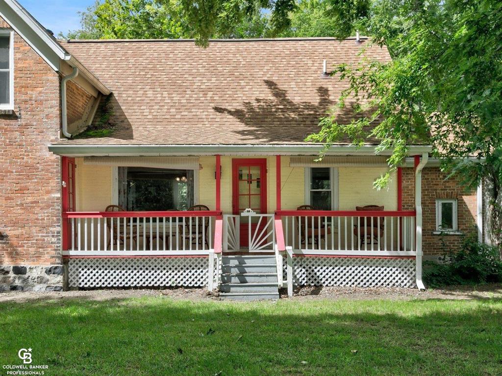 Welcome to your dream country escape! Nestled in the heart of Michigan's thumb, this beautifully maintained 4-bedroom, 4 bath farmhouse offers the perfect blend of rustic charm and modern comfort. situated on a spacious 1.6 acre lot along the scenic Lakeshore Road, this home provides peace, privacy, and plenty of room to roam, being situated on a quaint corner lot. Step into the inviting 25-foot covered front porch- perfect for morning coffee or relaxing evenings. Inside you'll find four generously sized bedrooms, with three of them having their own, private attached full bathroom, offering both convenience and comfort for family and guests alike. The home features a fenced in yard, ideal for pets, children, or a garden oasis. whether you're looking for a full-time residence or returning this home back to a bed and breakfast, this property offers the best rural living with the beauty of Lake Huron just minutes away.