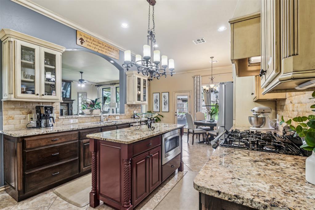 Welcome to this beautifully maintained home in the sought-after Rock Creek addition! With 4 spacious bedrooms—including a flexible fourth bedroom that can double as an office, and a large upstairs bonus room, there's plenty of space for work and play!

The primary suite features an upgraded bath with new granite countertops, modern fixtures, and a luxurious upgraded Jacuzzi and shower. The living room boasts engineered wood flooring, a cozy gas fireplace, and flows perfectly into the open layout. Fresh carpet, new windows in several rooms, and new mechanical updates, including a new water heater, water softener, and upstairs A/C unit—make this home move-in ready.

Outside, you’ll love the lush landscaping, backyard hot tub, and pergola—the perfect setup for relaxing or entertaining. Bonus features include an above-ground safe room, in-ground sprinkler system, and a prime location right across from the neighborhood pool and clubhouse.

Don’t miss your chance to call this one home! Schedule your private tour today!