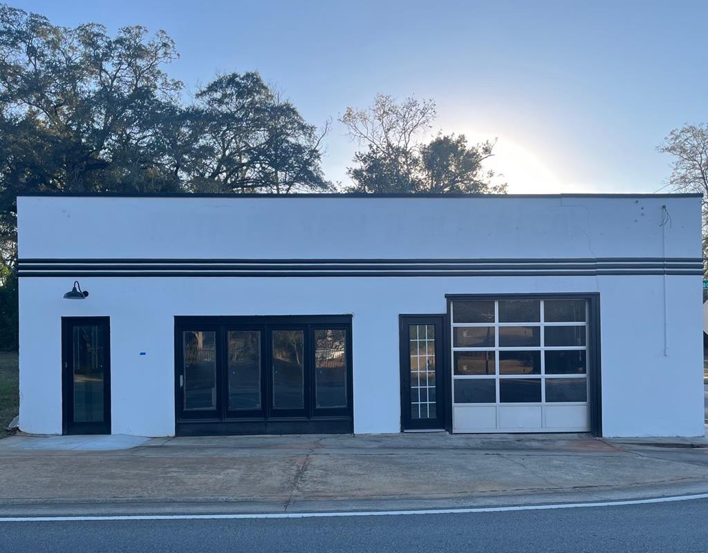Discover an incredible opportunity with this fully renovated 3,500 sq. ft. commercial property, completed this year. Featuring two private baths and abundant natural light from brand-new windows, this space boasts an expansive open floor plan and high ceilings, perfect for a design studio, office space, workshop, or any creative endeavor you envision. Its easy accessibility enhances functionality, making it an ideal setting for your business aspirations. Don't miss your chance to transform this versatile space into the hub of your success!  The Seller will also include the lot across the street for added parking and future value.