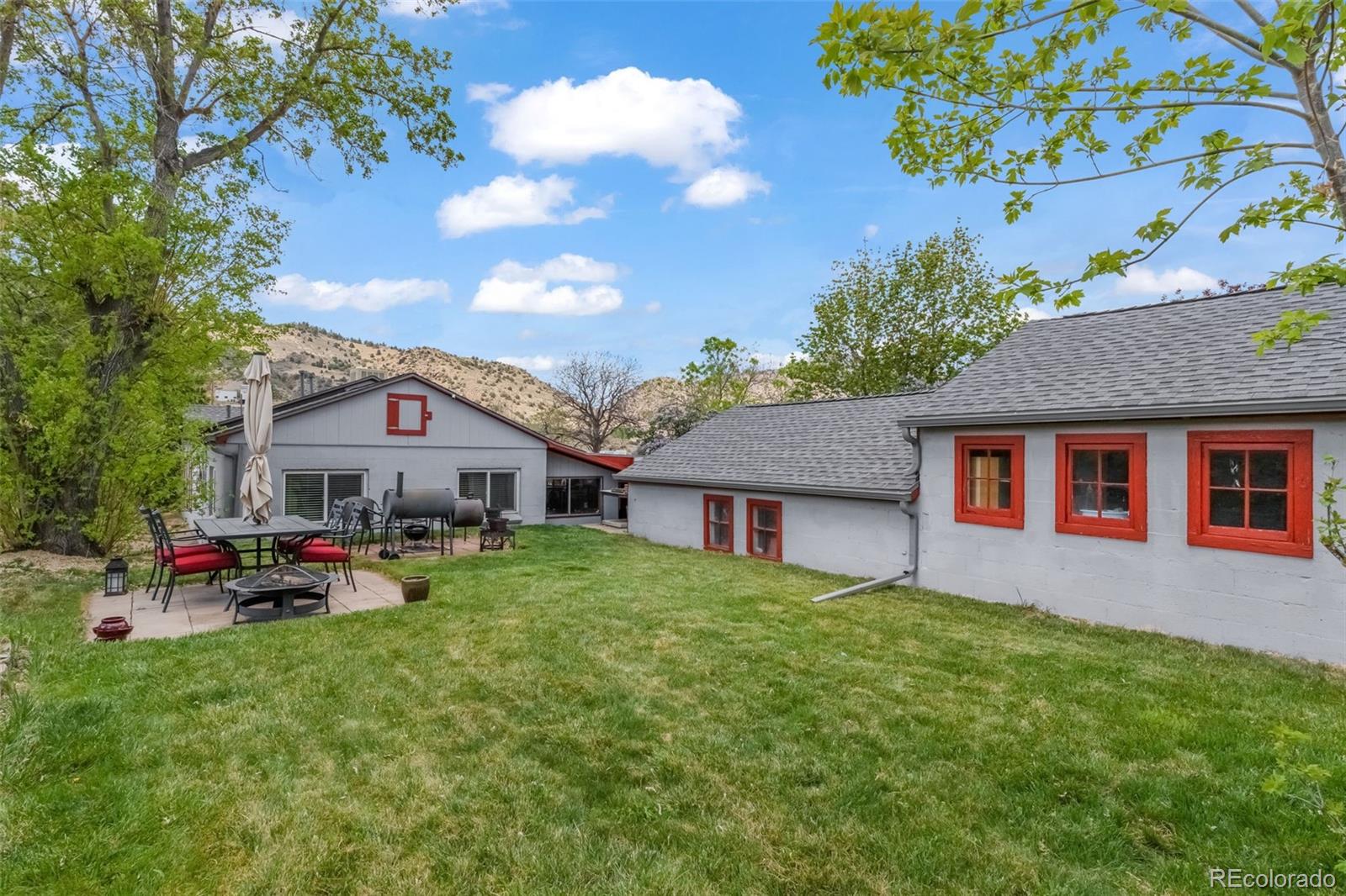 CHARMING FOOTHILLS PROPERTY on Just Over 1/2 Acre with Open Space Setting and Unmatched Access to Colorado’s Outdoor Lifestyle! Enjoy Beautiful Views of Mount Falcon Park from the Front Windows and Mount Glennon from the Back, Offering Stunning Colorado Scenery in Every Direction. Experience the Peace and Privacy of a Foothills Setting with Immediate Access to the Quaint Town of Morrison, World-Famous Red Rocks Amphitheater, and Bear Creek Lake Park. Convenient Access to C-470, I-70, 6th Ave, and Highway 285 Makes It Easy to Enjoy a Mountain Getaway or a Night Out in Denver. Property is Served by a High-Producing Well with Existing Pressure and Water Holding Tanks for Added Capacity, Plus an On-Demand Water Heating System. Fully Equipped Kitchen with Appliances Included, Along with Washer and Dryer. Multiple Workshop Areas Provide Excellent Space for Projects, Storage, or Hobbies, Ample Parking for Vehicles, Equipment, and Outdoor Gear.  Rare Opportunity to Own a Peaceful Foothills Retreat Where Privacy, Convenience, and Colorado Lifestyle Come Together!