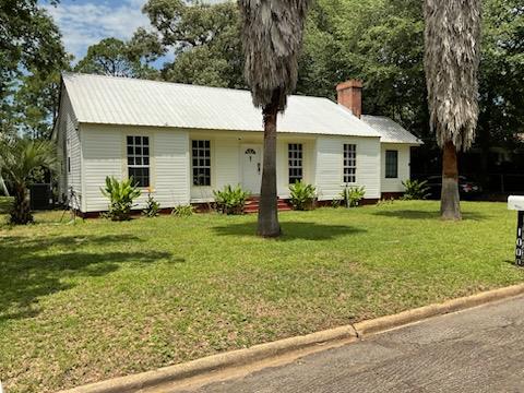 Discover the perfect blend of space, versatility, and convenience at 1000 Palmetto Street. This well-maintained property features 3 bedrooms, 2 bathrooms, with an additional room converted into a massive walk in closet and 1,879 sq. ft. of living space situated on a generous 0.28-acre lot. A separate 1-bedroom, 1-bath guest house provides endless possibilities for extended family, guests, rental income, or a private home office.    Outside, you'll find a spacious 20' x 24' carport ideal for protecting vehicles, boats, or equipment, along with a 12' x 25' garage/workshop offering additional storage and workspace.   Conveniently located just minutes from downtown Bainbridge, the property enjoys easy access to parks, shopping, dining, and outdoor recreation. Nearby attractions include Willis Park,  Cheney Griffin Park and the Flint River recreation areas featuring walking trails, playgrounds, boating, fishing, and community events.    This property offers the space you need, the flexibility you want, and a location that puts the best of Bainbridge within easy reach. Don't miss this  opportunity!