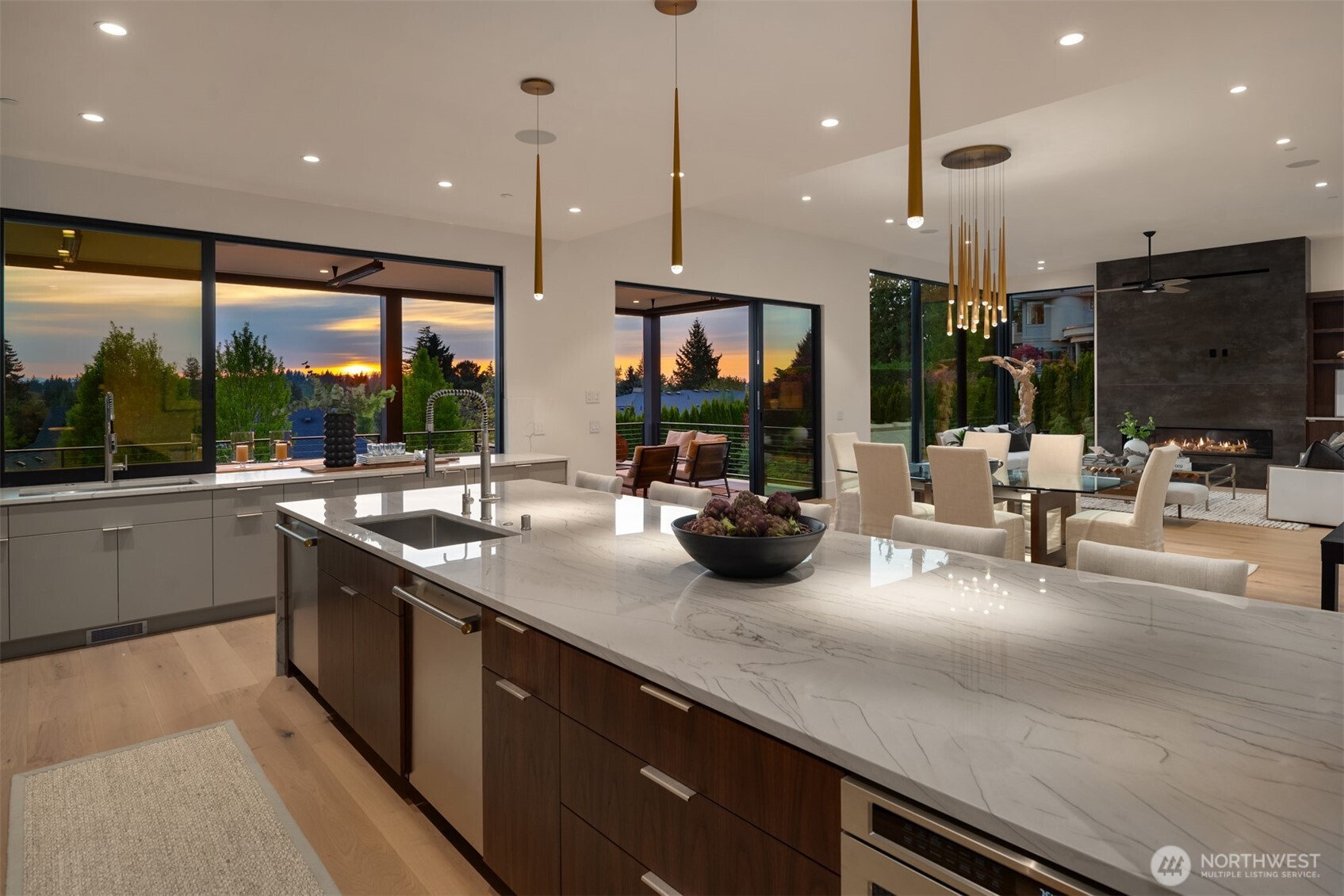Gourmet kitchen with sleek cabinetry, waterfall island, and high-end appliances — perfectly designed for both form and function.