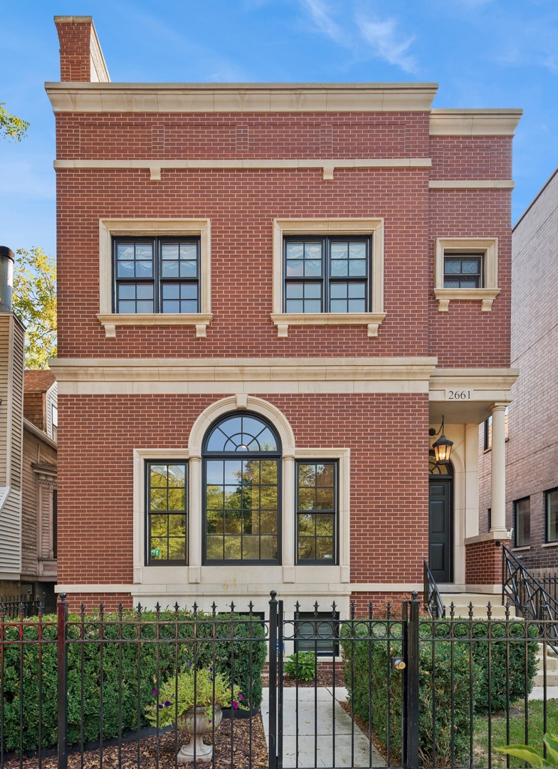 This spectacular extra-wide renovated home on an oversized 38' lot offers a rare opportunity to assume a 3.75% loan! Located on a coveted tree-lined Lincoln Park street and renovated just one year ago, this residence features stunning all-new kitchen and designer baths, and new hardwood flooring. The reimagined first floor creates an airy, modern flow: a spacious living room with high ceilings and elegant fireplace; a true first-floor office with two sets of double doors for privacy; and an expansive dining, kitchen and great room. The kitchen showcases one wall of floor-to-ceiling custom cabinetry with twin 36" SubZero refrigerator and freezers, Meile dishwasher, a two-tier island with mahogany snack bar, dual sinks and open shelving for display. The adjacent great room offers a beautiful fireplace plus a wall of cabinetry featuring a built-in desk and a bar with wine fridge and ice maker. The great room offers direct access to a convenient mudroom that opens to a huge backyard with sport court, a side yard or dog run with brand new turf and a 3+ car garage. The second level provides four large bedrooms, three new baths, and a double-sided laundry with utility sink. The luxurious primary suite features two big walk-in closets and a new spa bath with soaking tub, glass-enclosed steam shower, double vanity, heated towel warmer, and Toto Washlet toilet. The bright top floor bonus level includes a family or play room, a new powder room, and access to front and rear roofs awaiting your outdoor living ideas. The lower level offers an expansive family room with fireplace, two additional bedrooms, a full bath, second laundry, and three generous storage rooms. This exceptional extra-wide home, located in the Alcott Elementary School District, combines space, luxury, and outdoor living in a prime Lincoln Park location. Best of all, the assumable 3.75% loan can save you over $3,500 per month compared to today's rates, equating to hundreds of thousands of $$$ over the life of the loan!