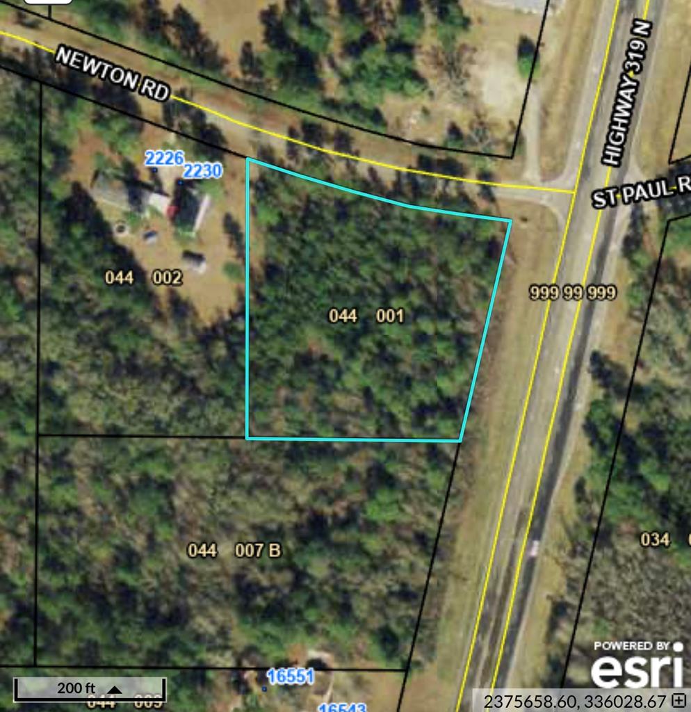 Property is zoned Ag, Would make a great commercial spot or residential.  Wooded, Flat