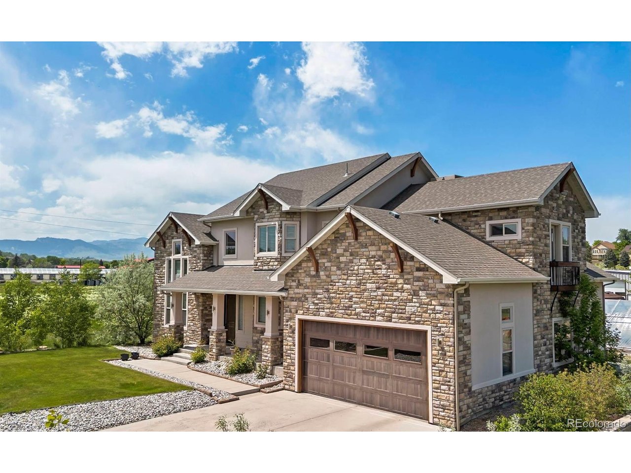 Don't miss this opportunity to own a stunning homestead on 3.7 acres, featuring a custom-built home with a private well, its own enchanting pond traversed by Leyden Creek, and a spacious workshop. This two-story residence offers an open-concept living space filled with natural light, showcasing vaulted ceilings, beautiful wood floors, a spectacular custom staircase, and a radiant floor heating system throughout. The family room features a cozy wood-burning fireplace (effectively warming up almost the entire house) and seamlessly connects to the gourmet kitchen, which is complete with a quartz island, beautiful cabinetry, and stainless steel appliances. From the dining area and kitchen, glass doors open to the back patio, where you can take in breathtaking mountain views.The second floor leads to the serene master suite, which boasts a private balcony with mountain views and a soaking tub in the master bathroom. Additionally, there are three more spacious bedrooms, one of which has its own balcony and vaulted ceilings.The property includes a workshop, a dedicated area for gardening, and space to keep small animals, making it perfect for those looking to embrace an active, homesteading lifestyle. Located just 5 miles from Old Town Arvada, you'll enjoy the perfect balance of rural tranquility and convenient city living, with easy access to shopping, dining, and entertainment options. The nearby Apex Recreation Center offers a variety of recreational activities, and being close to the city means you can enjoy the best of both worlds-peaceful country living with all the conveniences of urban life. Experience the beauty and tranquility of living on your own piece of homestead, with the majestic Rocky Mountains just a short drive away, providing endless outdoor adventures and breathtaking scenery. Schedule your showing today!