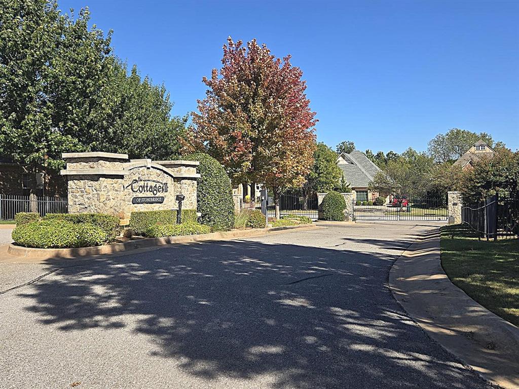 Great new listing in The Cottages of Stonebridge! Gated! 2 bedrooms , 2 bathrooms plus a study. 2,080 square feet(mol). Great floorplan featuring raised ceilings, hardwood flooring, tall doorways & more. Spacious, open living area featuring an attractive stone fireplace, decorative mantle plus a ceiling fan. Spacious kitchen featuring great counter & cabinet space, breakfast bar, stainless appliances, eating space plus a pantry. The large master suite has great wall space and will easily accommodate king sized furniture. It also feature a separate tub & shower, double vanity and large walk-in closet.  The inside utility room features great storage space, counter top space plus a sink.  Heat & Air system recently updated. Exterior features include a landscaped yard, sprinkler system and a nice covered back patio overlooking a wooded greenbelt. This is a beauty!