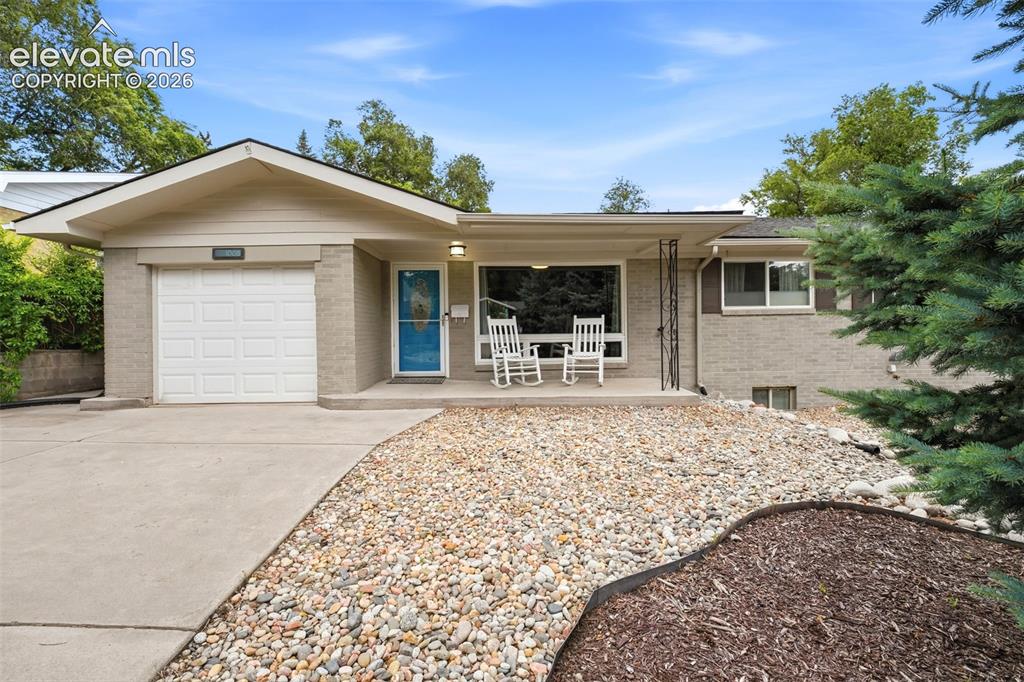 Rare opportunity - Beautifully reimagined Mid-Century Modern home in the highly desirable Lower Skyway neighborhood * Nestled among mature trees & established landscaping, this timeless ranch-style seamlessly blends iconic architecture with today's conveniences * Spectacular Cheyenne Mountain views provide a stunning backdrop, best enjoyed from the inviting front patio * Warm hardwood flooring, expansive windows, clean lines & light-filled living spaces create an inviting atmosphere throughout the main level * Impressive great room offers an open, welcoming space ideal for gathering & entertaining * Updated kitchen showcases contemporary finishes, granite countertops, abundant cabinetry, stainless steel appliances & effortless flow into the dining & living areas, ideal for everyday functionality & entertaining * Thoughtfully designed floor plan offers 3 spacious bedrooms on the main level, one could be primary, one could be an office to accommodate a variety of lifestyles * Mud room a bonus off the garage * Fully finished lower level provides exceptional flexibility boasting a large Rec area, Family room & guest accommodations or lower primary suite with ensuite bath, dedicated fitness room & huge laundry / storage room * Every space has been carefully curated to preserve the home's architectural character while delivering modern comfort & versatility * Step outside to an incredible covered living area highlighted by a stunning wood-planked ceiling, creating a true extension of the home & perfect setting for year-round entertaining * Fenced back yard offers mature landscaping, multiple gathering spaces & tranquil setting rarely found in today's newer communities * Located just minutes from hiking & biking trails, Cheyenne Canyon, parks, downtown Colorado Springs, shopping, dining & award-winning District 12 schools, this home offers the perfect combination of curb appeal, architectural significance, modern updates & an unbeatable Southwest lifestyle, Look here...