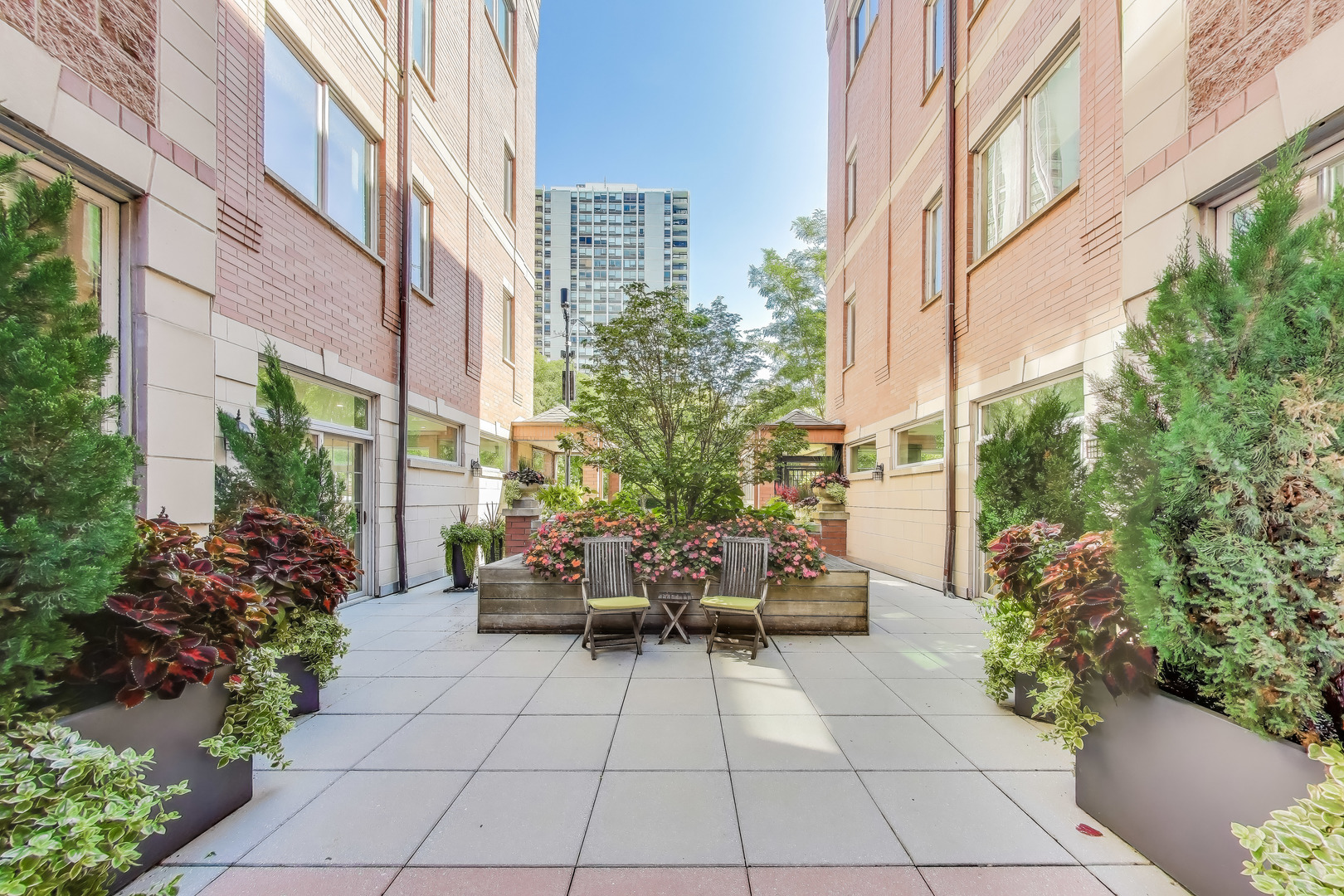 Sun-Drenched, Fully Renovated 2BD/2.5BA Duplex Condo on the Gold Coast/Old Town Border.  Welcome to your dream home in one of Chicago's most coveted neighborhoods-perfectly positioned on the border of the Gold Coast and Old Town. This beautifully updated 1,700 SF 2-bedroom, 2.5-bathroom duplex condo blends luxury, comfort, and convenience in an intimate 14-unit building.  Step into a sun-drenched south and east-facing living room, where natural light pours in throughout the day. Enjoy cozy evenings by the inviting gas fireplace or sip your morning coffee on the private, east-facing terrace, thoughtfully finished for relaxing mornings and grilling in the evening.  The home has been completely renovated from top to bottom, featuring a brand-new, top-of-the-line kitchen, stylish spa-inspired bathrooms, custom closets, designer built-ins, and luxury vinyl plank (LVP) flooring throughout. Every detail has been considered to create a seamless blend of modern design and functional living.  Retreat to two spacious bedrooms, each with updated en-suites, while the additional powder room on the main level makes entertaining a breeze.  This home is nestled in a quiet, beautifully landscaped courtyard building-a peaceful oasis in the heart of the city. Directly across the street, a small, tranquil park offers the perfect spot to walk your dog, read a book, or unwind outdoors.  Additional features include:  Heated garage parking space with extra room for storage  Building storage room and dedicated bike room  Low-maintenance living in a well-maintained, boutique building  Located steps from the lakefront, Wells Street dining, Lincoln Park, world-class shopping, and public transit, this location offers the best of both city excitement and neighborhood charm.