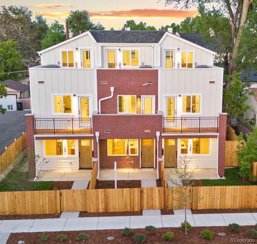 5% Down, 4.5% Rate!!! Other builder and lender incentives to fit the buyer! This transitional-modern townhouse blends warmth, sophistication, and functionality in every detail. The open-concept main floor is designed for everyday living and effortless entertaining. Real, site-finished oak hardwood floors throughout, complementing the custom oak kitchen island and staircase. The kitchen features an 8-foot quartz island with plenty of seating, open shelving, a built-in range hood and a countertop cabinet—perfect for hiding your coffee station. And the spacious walk-in pantry is ideal for the open-concept living. The primary suite features a balcony, double vanity, walk-in shower and double closets. Laundry is located on the same floor as well as the 2nd bedroom with a Hollywood bath. The 3rd floor offers even more entertainment space with a wet bar and huge 180 square foot rooftop deck with city views. Fantastic location: steps away from the light rail station offering a 10 min ride to Union Station, short distance to Sloan's Lake Park, dining and restaurants; even a walk away from Mile High Stadium for game day! **This location qualifies for the Community Reinvestment Act (CRA) Loan program** Features include: • No origination fee, no underwriting fee • Reduced rate 30-year Fixed • As low as 3% down and lender pays the Mortgage Insurance. • $1500 or $3000 closing cost assistance available No Income restrictions