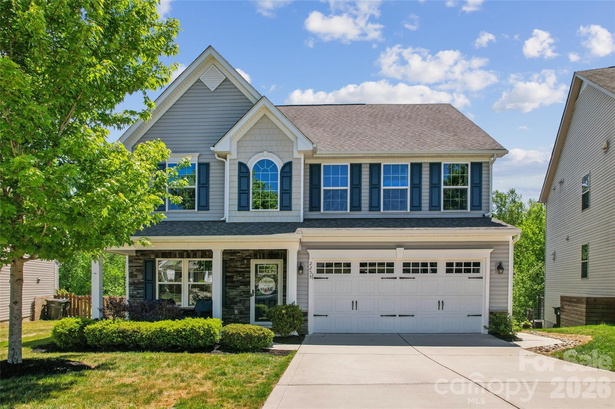Welcome to a home where comfort meets elegance, and every detail has been thoughtfully curated for the way life is meant to be lived. Located in a resort-style community, this home offers the perfect blend of warmth and privacy. Boasting 3 spacious bedrooms with the flexibility of a 4th bedroom or office, this home is perfect for growing families or visiting guests. From the moment you step inside, you are greeted by inviting spaces, and a sense of care that can only come from a home that has truly been loved.The gourmet kitchen was designed to inspire gathering and connection. Complete with granite countertops, a large center island, double ovens, and abundant cabinetry, this space effortlessly combines beauty and function. Whether hosting holiday celebrations or preparing quiet family dinners, the kitchen flows seamlessly into the living spaces, creating the perfect backdrop for everyday moments and unforgettable memories alike. The family room invites you to slow down and stay awhile, anchored by a beautiful stone fireplace that adds warmth, charm, and character. Upstairs, a spacious loft offers endless possibilities. It can be the perfect media room, playroom, reading retreat, fitness area, or additional living space designed to adapt to your family’s needs. The oversized primary suite is truly a retreat of its own. With 2 walk-in closets, lack of space will be a thing of the past.As you step outside, a beautifully crafted covered screened-in porch awaits for you. Sip your morning coffee as the sun rises, unwind in the evenings with a gentle breeze, or gather with friends and family in a space that feels both peaceful and inviting. The fully fenced backyard offers plenty of room to play, entertain, garden, or simply enjoy the privacy created by the wooded backdrop behind the home.The lifestyle this community offers is truly exceptional. Located in a sought-after resort-style neighborhood filled with amenities, residents enjoy the convenience of having both the elementary and middle schools located right within the community, making daily life both easy and connected.This is more than just a house; it is a place where memories are made, laughter echoes through the rooms, and peaceful moments are found in the beauty of everyday living. A home that has been impeccably cared for, thoughtfully upgraded, and ready to welcome its next chapter.