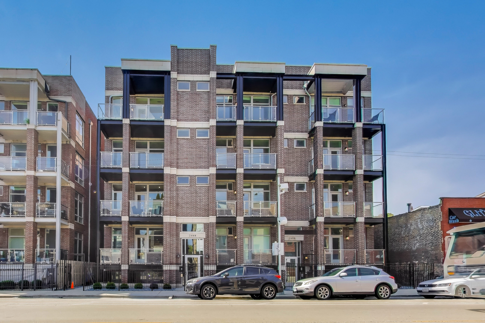 Reimagined Lincoln Park living at 2448 N Clybourn. This elevator building was originally built in 2019 and renovated in 2025. Unit 2 offers 3 bedrooms, 2.1 baths, and over 1700 sq ft of updated space with direct elevator access. Freshly painted with new oak floors, designer lighting, Ecobee thermostats and modern hardware throughout. The chef's kitchen boasts quartz countertops, brand-new Thermador appliances, and beverage fridge. Large living space offers custom white oak rifted built in. The spacious primary suite features a large walk-in closet, double vanity with Grohe fixtures, soaking tub, and separate shower with rain head and bench. Two private balconies extend your living space outdoors, while additional walk-in closets  and side by side laundry add convenience. Updated building amenities include an elevator,  garage parking, dog run, private storage, and bike/stroller storage. Steps from Wrightwood Park,  Midtown Athletic Club, Lakeshore Athletic, Pequods, Prescott Elementary, Clybourn Corridor shopping, Augies, Mia Nueva Tierra, Southport dining, and more.  1 year warranty included with purchase.