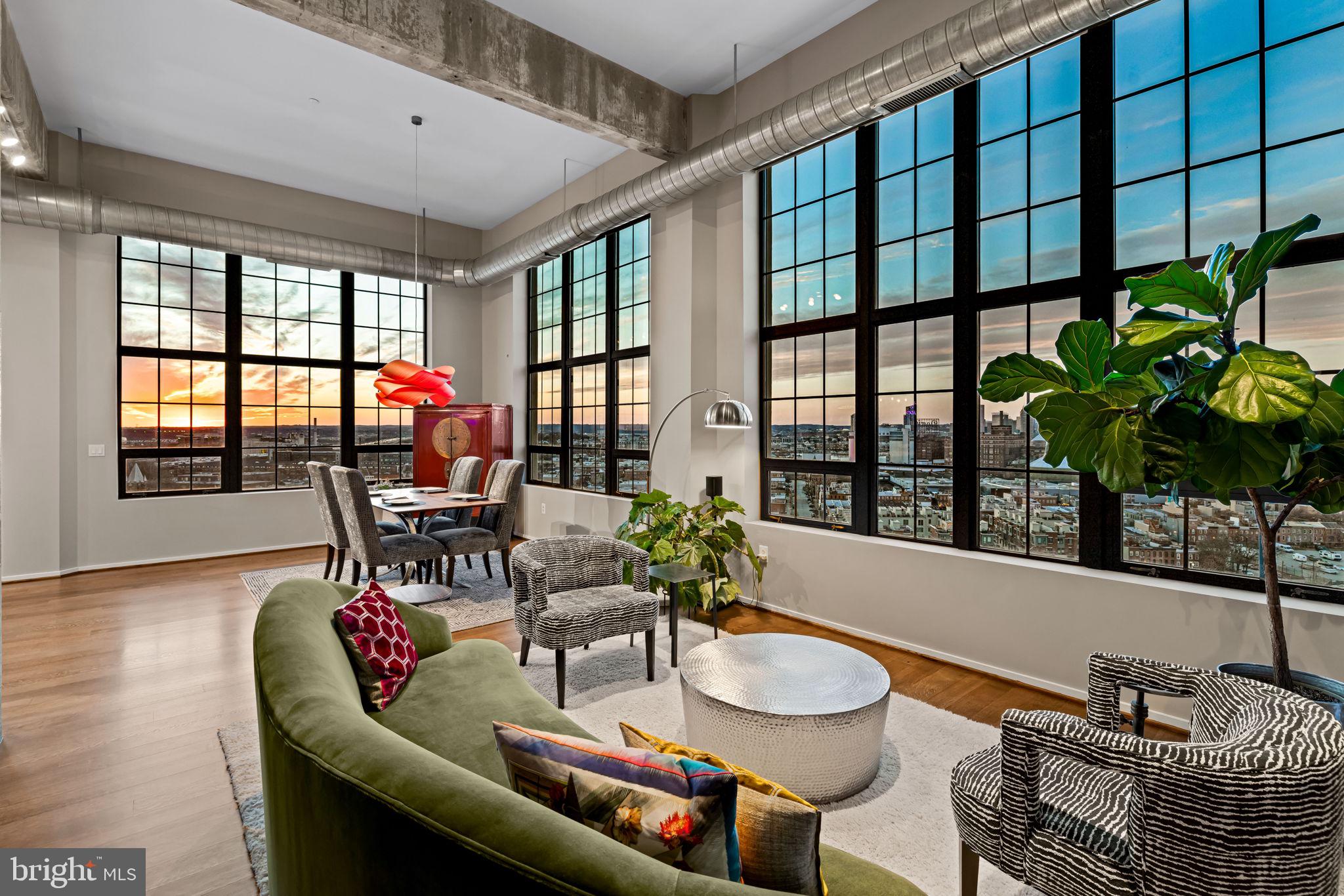 Some homes offer a view. This one surrounds you with them.From its coveted 15th-floor end-unit position, this exceptional two-bedroom, two-and-a-half-bath residence captures water, harbor, city, and skyline views spanning nearly 300 degrees. Floor-to-ceiling windows fill the home with natural light and transform the waterfront into an ever-changing backdrop—from morning light shimmering across the water to passing ships, vibrant sunsets, seasonal fireworks, and the city glowing after dark.Inside, the scale is every bit as impressive as the scenery. Generous living and dining areas offer abundant space to entertain, unwind, and work from home, while the thoughtfully designed layout feels both expansive and exceptionally livable. Multiple exposures enhance the natural light, privacy, and remarkable sense of openness throughout.Silo Point is one of those rare buildings: either you haven’t discovered it yet and are about to fall in love, or you already know exactly why people wait for the opportunity to live here. The experience extends far beyond the home. Owners enjoy a 24-hour front desk, on-site management, package concierge, game room, library, conference rooms, and an impressive fitness center with a yoga room and private treatment rooms. Crowning it all is the spectacular 19th-floor Sky Lounge—an unforgettable setting for relaxing, entertaining, and taking in the waterfront and skyline.Secure residents-only garage access, guest parking, EV charging, bike storage, and on-site car-washing stations make everyday life easier. Two deeded parking spaces and two deeded storage lockers provide even more of the space and convenience that are so difficult to find in city living.With its extraordinary light, expansive proportions, exceptional privacy, and breathtaking views in nearly every direction, this is more than a home with a view. It is the kind of residence guests remember—and the kind of home that makes an ordinary evening feel anything but ordinary.Available for occupancy October 1 | Two deeded parking spaces | Two deeded storage lockers