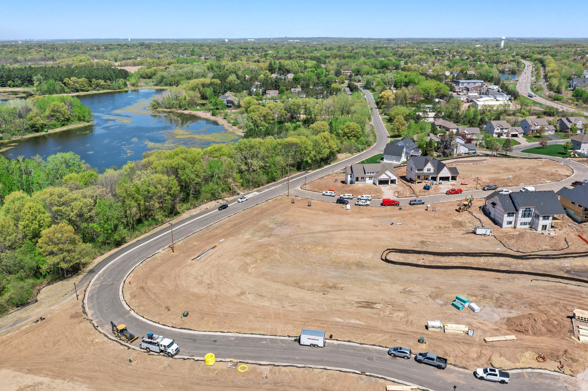 Nestled within the Parkside Circle neighborhood in Eagan, this slab on grade lot offers a rare opportunity to create the home you’ve always envisioned. This vacant lot is part of a vibrant and welcoming community. Stone Cottage offers custom home construction with various floor plans, and site options. Whether you're dreaming of a classic two-story or one-level living, you’ll find endless options and expert craftsmanship to bring your vision to life. Step outside your door and enjoy scenic walking trails at Lebanon Hills Regional Park and all the conveniences of nearby local restaurants, boutique shopping, and everyday essentials. Located within the award-winning 196 School District, it’s the ideal setting for an active lifestyle. With multiple lots available, now is the perfect time to select your ideal homesite and start building in one of Eagan’s most desirable neighborhoods.