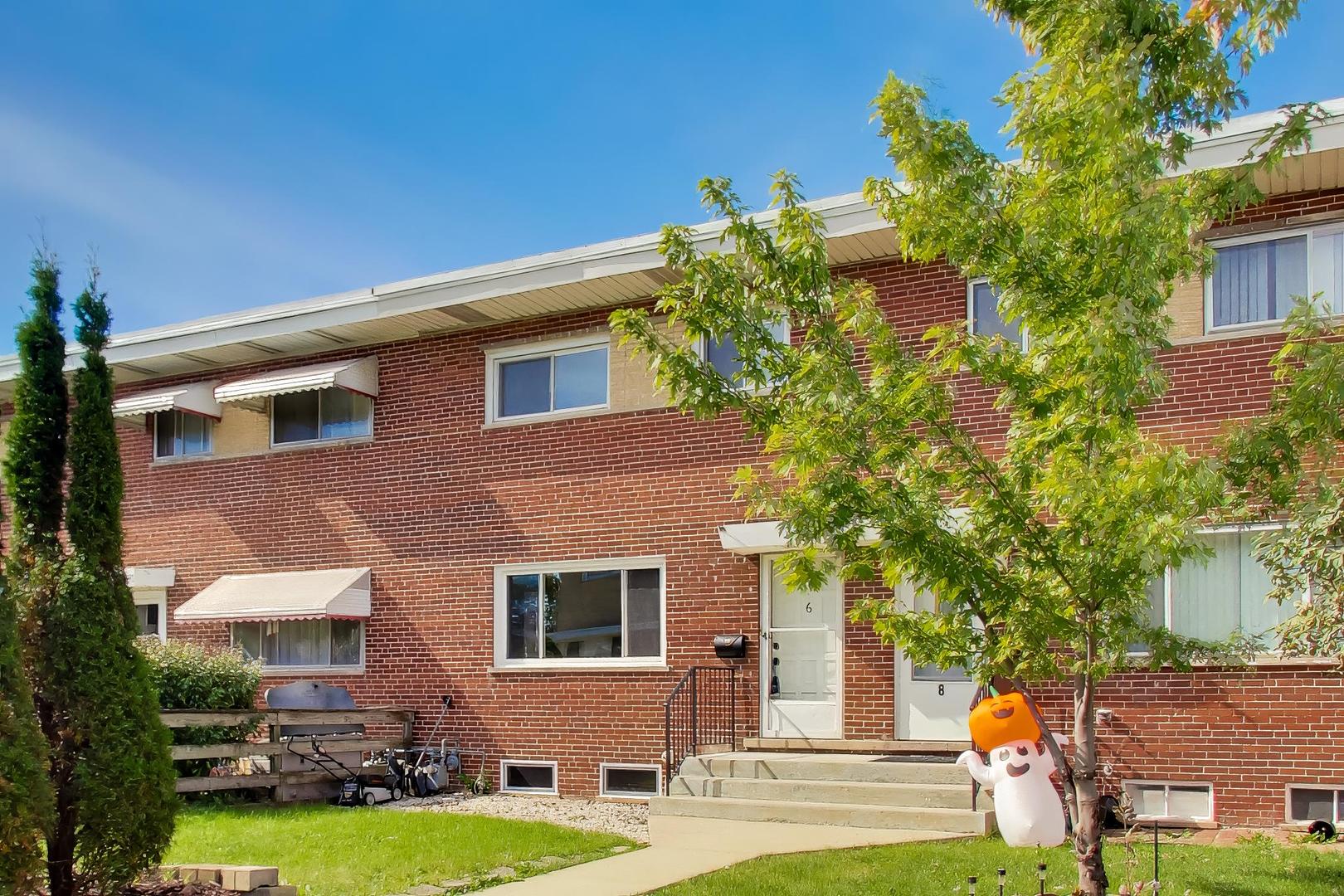 Discover this updated 3-bedroom, 1.5-bath brick townhome in Mount Prospect, Illinois, offering 1,150 square feet of above-grade living space PLUS a finished basement! Located at 6 E Judith Ann Drive, this move-in-ready home combines comfortable living, modern updates, and low HOA fees at an attractive price. The bright, spacious living room features hardwood flooring and neutral finishes, while the updated kitchen showcases granite countertops, two-tone cabinetry, a tile backsplash, and brand-new stainless steel appliances (2026). Upstairs, three bedrooms with hardwood flooring and an updated full bathroom provide comfortable accommodations. Need more space? The finished basement offers flexible additional living space for a recreation room, home office, fitness area, or media room, plus a separate laundry and utility area with additional storage. Recent improvements include a new roof (2024), new basement windows (2026), main-level windows (2017), furnace (2017) with coils cleaned in 2026, central air conditioning (2018), and water heater (2017). One assigned parking space, ample street parking, and low monthly HOA fees add to the appeal. If you're searching for an affordable, move-in-ready 3-bedroom townhome in Mount Prospect with an updated kitchen and finished basement, this one deserves a closer look!