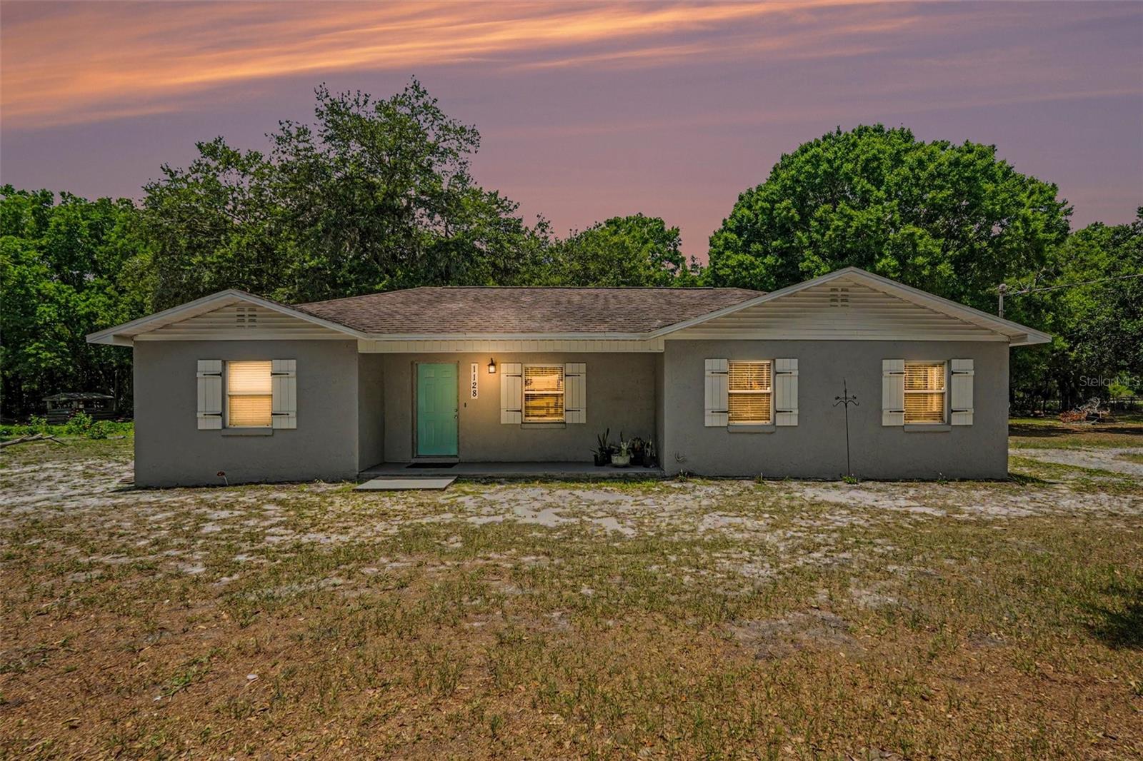Welcome to country living where you have room to roam, garden and have your own fresh eggs on an oversized 1-acre land parcel graced by mature landscaping and friendly neighbors on both sides. Great news, it is not in a flood zone! Bring your RV, boat, 4 wheelers and any other toys. This property is fully fenced with a double front gate which provides plenty of parking and room for your animals to roam safely. The home has matching tile floors throughout the main living space as well as the 4 bedrooms and 2 full baths with a split bedroom plan. The home is also wired for a generator. The 2 sheds and chicken coop will be left for the new buyers. Total HVAC system has been replaced. Roof is only 10 years old. Great LOCATION gives you easy access to routes going to Tampa, USF, MacDill AFB, Plant City, New Tampa and Lakeland. All this that offers you many years of Love, Laughter & Joy -Right Here! Come check out this property while it is still available!