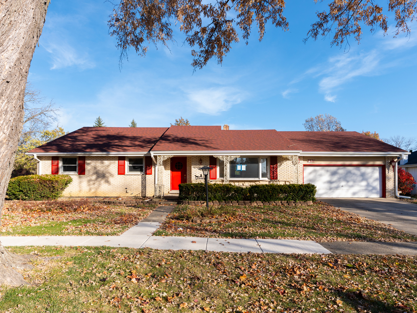 Solid brick ranch with nearly 2,300 square feet on a big lot with mature trees and plenty of room to spread out! L-shaped living and dining room with a bay window for extra light. Kitchen with built-in double oven and separate cooktop opens to the family room with wood burning fireplace and gas starter, great for game days or movie nights. Formal dining room for holidays or everyday dinners. Massive rec room addition with skylights is an awesome flex space. Think playroom, home office, home gym, or possible fourth bedroom. Primary bedroom has its own full bath, and there is an additional second full bath on the main level. Full unfinished basement with concrete foundation for storage now, and future finishing later. Oversized two car garage, deep backyard ready for backyard hangouts, and a convenient location close to shopping, dining and parks. Bring your ideas and make this one yours!