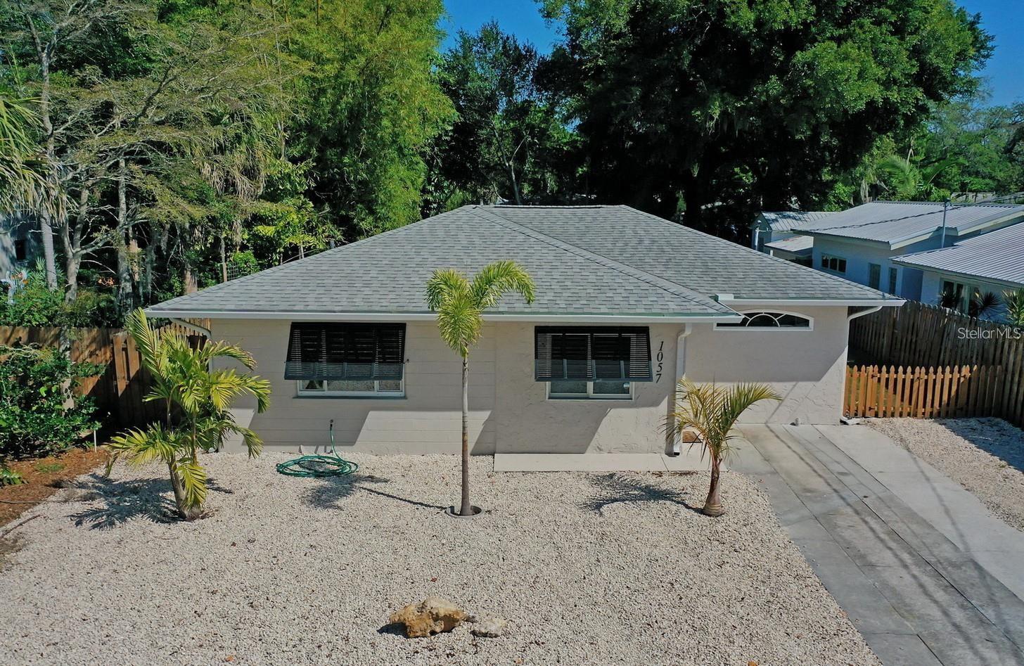 CAN'T BEAT LOCATION! Seller needs to take a loss of his tax return meaning this is a great opportunity for you to get a nice, single-family home on a large lot for under $500K in the highly desirable Indian Beach Sapphire Shores neighborhood. This won't last long and has to close in 2025 - it is priced to go under contract today! Don't miss out on this beautiful 3 bedroom/2 bathroom with an office, spacious family room, and bright dining room facing the backyard. Additional perks include an open, upgraded kitchen, covered patio to sit and enjoy a large, private fenced in yard. Ample space for additional patio space and/or pool. This wonderful home boasts plentiful natural light, lots of space, nice layout, and upgrades. A new roof was added in 2016 and new HVAC in 2020. Sapphire Shores is a highly sought-after neighborhood for individuals, couples, and families. Located 1 block from Sarasota Bay and only a few short minutes to downtown Sarasota, St. Armand's Circle, Bay front parks and local beaches. Neighborhood is walkable, easily accessible, and provides easy access to downtown, Sarasota Bradenton International Airport, and the surrounding beaches. This gem is a perfect family home or retirement in paradise. Great rental income for investors with 7-night minimum per the City. The neighborhood association (IBSSA) is not mandatory but a great way to get involved and the association is a real plus to the community.