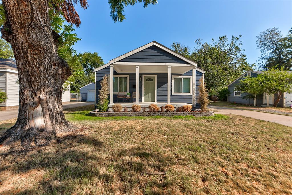 Welcome home to this beautifully updated bungalow, where timeless charm meets modern convenience. Fresh interior and exterior paint, refinished hardwood floors, new tile, and numerous additional updates make this home truly move-in ready. Inside, you'll find a private primary suite, two additional bedrooms, and a versatile office/flex room that can easily adapt to your lifestyle. The home also features energy-saving solar panels, a detached garage with abundant storage space, and a spacious back patio that's perfect for relaxing or entertaining. Enjoy quiet mornings or peaceful evenings on the charming front porch swing, and take advantage of the home's ideal location just minutes from campus, shopping, dining, and entertainment. With its thoughtful updates, character, and prime location, this home is ready to welcome its new owners.