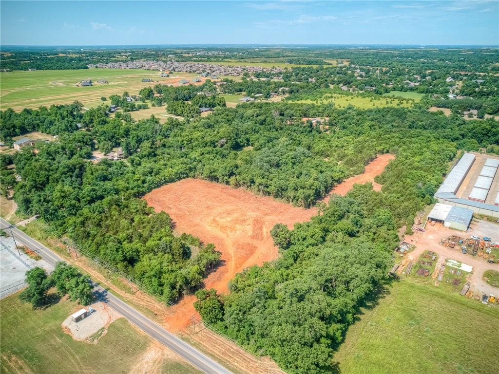 Development opportunity in growing area! 16.35 acres, Zoned C-1 and has a 12" water line on the East boundary. Great location near Riverwind Casino, just South of Hwy 9 on 24th/Santa Fe Ave. The new on/off ramp to I-35 is now complete and many new businesses and restaurants are in the area. Goldsby City limits. Property will qualify for several water meters.