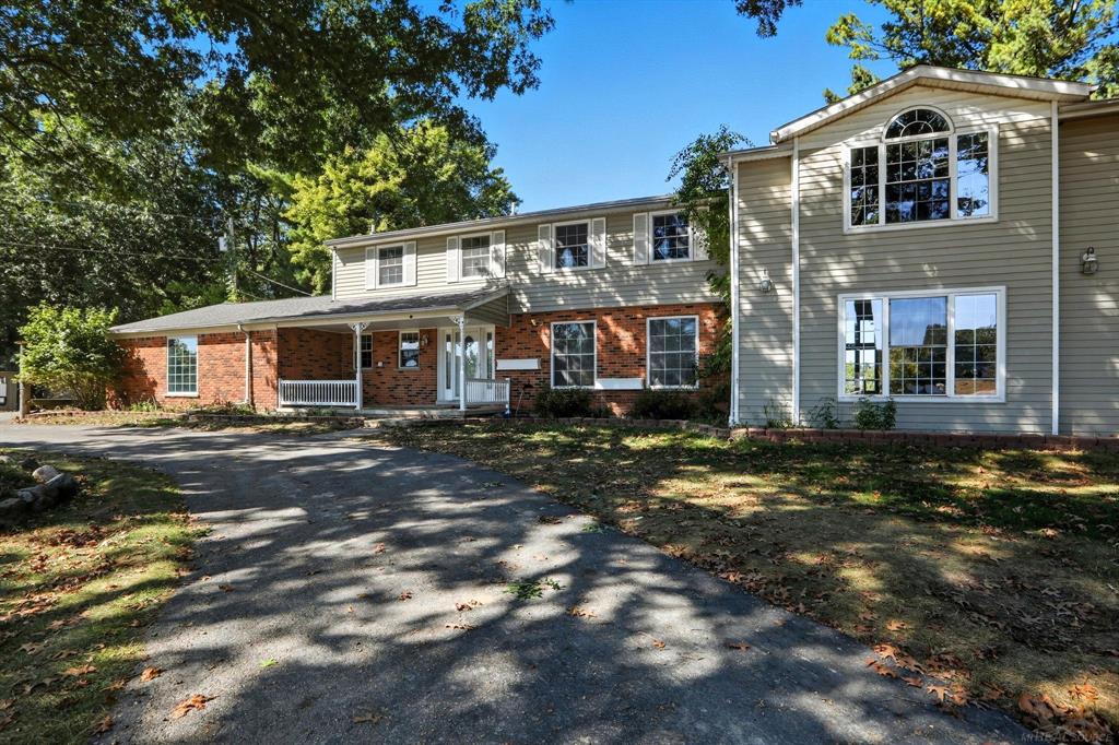 Discover this spacious colonial home perfectly situated on a rare 6-acre parcel along the shores of Grampian Lake. Offering a unique blend of privacy, space, and breathtaking water views, this property is truly one of a kind. Step inside and be captivated by the expansive great room featuring soaring 20-foot ceilings and large windows that frame the lake and flood the space with natural light. The open, flowing layout is ideal for both everyday living and entertaining, complemented by expansive wood decking that invites you to relax and take in the peaceful surroundings. The home boasts generously sized bedrooms, including a massive primary suite designed as a true retreat. A finished walkout basement with a convenient half bath provides additional living space, perfect for recreation, a home gym or work space. Outside, multiple outbuildings add versatility to the property, including a pole barn with partially finished, non-permitted work-ideal for storage, hobbies, or workshop space. With its unmatched acreage, serene lake frontage, and versatile living spaces, this property offers endless possibilities for those seeking both comfort and opportunity.