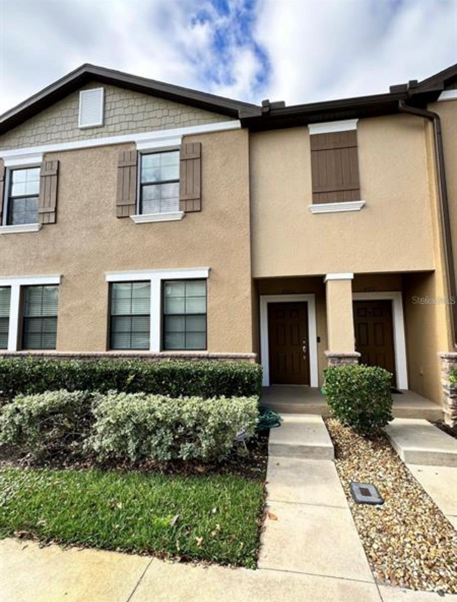 Don’t miss this incredible opportunity! The seller is highly motivated. Schedule your private showing today.This beautiful 3-bedroom, 2-bathroom townhouse is located in one of the most desirable and private communities in the area. While Wesley Chapel continues to grow and thrive, this home offers both privacy and convenience. Step inside to a spacious and elegant open living and dining area, perfect for relaxing or entertaining. The kitchen is thoughtfully designed with 42-inch cabinets, granite countertops, stainless steel appliances, and a walk-in pantry. The first floor features a bedroom with a walk-in closet and a full bathroom with granite countertops and ceramic tile, making it ideal for guests or a home office. Enjoy the outdoors from the covered, screened patio, perfect for quiet mornings or evening relaxation. Upstairs you’ll find a large and convenient laundry room, along with a secondary bedroom with a walk-in closet and full bathroom. The spacious primary suite offers a luxurious bathroom with a large walk-in shower, elegant granite finishes, and dual vanity sinks.Additional features include two designated parking spaces and plenty of guest parking. Residents enjoy access to the wonderful amenities of Meadow Pointe IV, including a playground, basketball courts, tennis courts, and a fitness center.The location is exceptional, close to top-rated schools, restaurants, shopping, and entertainment, including The Shops at Wiregrass, Tampa Premium Outlets, and easy access to the interstate.