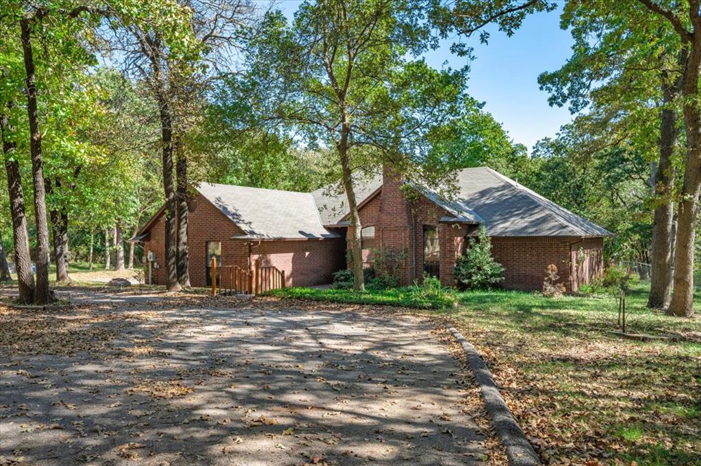 Welcome to 14674 Fontella Lane in Edmond!
This stunning property offers the perfect blend of comfort, space, and nature. Nestled on 2.18 wooded acres, this serene retreat features a 2,065 sq. ft. main home with 3 bedrooms, 2 bathrooms, and 2 spacious living rooms, plus a 576 sq. ft. guest house with 2 bedrooms and 1 bath—ideal for extended family, kids, or a private mother-in-law suite.

The main home boasts a bright, open floor plan with large windows that invite natural light and showcase the beautiful wooded surroundings. The living areas provide plenty of room for entertaining or relaxing, while the kitchen and dining spaces flow seamlessly for everyday comfort.

Step outside to enjoy peace and privacy surrounded by mature trees, offering the perfect setting for outdoor living, gardening, or simply soaking in the tranquility of nature. Located in a quiet area of Edmond.

?? Key Features:

2,065 sq. ft. main home — 3 bed | 2 bath | 2 living areas

576 sq. ft. guest house — 2 bed | 1 bath

2.18 wooded acres in beautiful Edmond, OK

Perfect for multigenerational living 

Peaceful country feel just minutes from the city

This property is truly a rare find in Edmond — a spacious home, private acreage, and a guest house all in one. Don’t miss the opportunity to own your own wooded retreat!