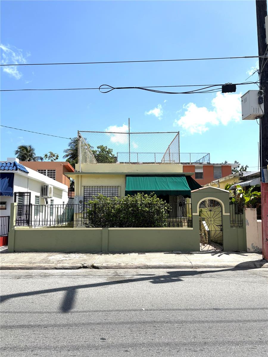 Multifamily Investment Opportunity | Barrio Obrero, SanturcePositioned in the heart of Santurce's rapidly evolving Barrio Obrero neighborhood, this three-unit multifamily property presents a compelling investment opportunity in one of San Juan's most strategically located urban districts. The municipality has recently completed—and continues to invest in—infrastructure improvements designed to enhance accessibility, pedestrian connectivity, and the overall appeal of the area, making Barrio Obrero an increasingly desirable destination for residents, businesses, and investors alike.Ideally located just minutes from the Sagrado Corazón Train Station, Universidad del Sagrado Corazón, major highways, shopping, dining, and ongoing urban redevelopment, the property benefits from exceptional connectivity and strong rental demand.The building consists of three income-producing units:* Main Residence (Front – First Floor): A comfortable 2-bedroom, 1-bathroom residence.* Second Unit (Rear – First Floor): A 1-bedroom, 1-bathroom studio-style apartment.* Third Unit (Second Floor): A 1-bedroom, 1-bathroom apartment with exclusive access to a private rooftop.One of the property's most attractive features is its expansive rooftop, which offers the potential to be developed into a fourth residential unit, subject to obtaining the necessary permits and approvals. Additionally, given the property's location within a corridor surrounded by thriving commercial activity, there is potential for commercial use, should the appropriate zoning variance be obtained.The close proximity to Universidad del Sagrado Corazón creates an outstanding opportunity to meet the growing demand for student housing, an increasingly important segment of the local rental market. Whether operated as long-term residential rentals, student housing, or a mixed-use investment, the property offers multiple avenues for value creation and income generation.With its prime urban location, redevelopment potential, and flexibility for both residential and possible commercial use, this property represents an exceptional opportunity for investors seeking to capitalize on the continued transformation of Santurce.Highlights:* Three-unit multifamily property* Prime location in Barrio Obrero, Santurce* Minutes from Sagrado Corazón Train Station and Universidad del Sagrado Corazón* Close to major highways, retail, restaurants, and urban redevelopment* Rooftop with potential for a fourth unit (subject to permits)* Potential commercial use with approved variance* Strong student housing and rental income potential* Ideal for investors or owner-occupants seeking supplemental rental incomeCash Sale Only. Serious inquiries only.