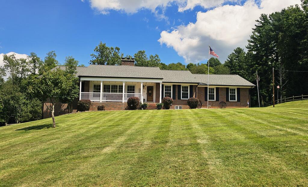 Beautiful Brick Ranch with Exceptional Outdoor and Garage Space! Now being offered for your consideration is this incredibly maintained home offering 4-bedrooms and 3 full baths. This brick ranch is a blend of comfort, quality and some recent improvements. The phrase "move in ready" not to be taken lightly with this home! On the main level you will find formal living areas, cozy den, custom kitchen with walk in pantry, office/exercise room, primary bedroom with en-suite bath, guest bedroom, a full bath, laundry room, 1/2 bath and 2-car attached garage with storage room. There are beautiful hardwood floors throughout, with kitchen and bathrooms having ceramic tile. The attention to detail when this home was built wasn't spared and neither was quality. The lower-level showcases the great room with gas-log fireplace, 2 additional bedrooms, another full bathroom and 2 spacious storage rooms. There is no shortage of storage space! But here is what will seal the deal......the outdoor living space!! In 2020 the owner added an amazing, covered patio for entertaining and relaxing. It has an outdoor partial kitchen and oversized hot tub! Can you imagine the fun times you and your family will have? For the man that needs space for his "workshop, oversized trucks, ATV, and much, much more there's a 24 x 50 heated detached garage that can easily hold 4 vehicles! But there's also another storage building for lawn care equipment. This will come as no surprise, but the lawn and landscaping are meticulously cared for! To summarize; spacious layout, quality features, recent improvements, inviting outdoor space and impressive garage! Yes, we know you're ready to move in! So don't hesitate, call now to schedule your private showing so you can see for yourself everything this property has to offer!