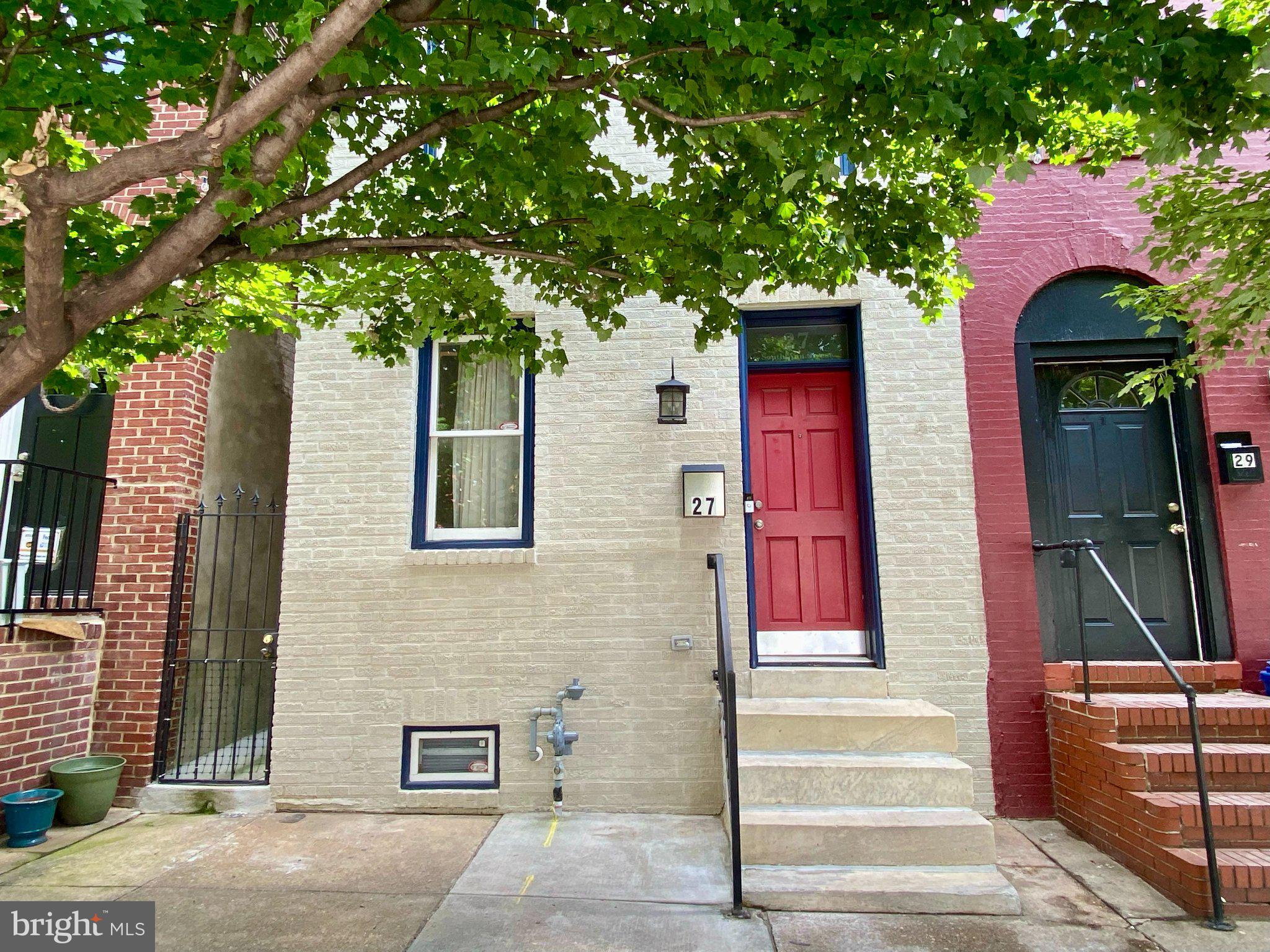 Thoughtful design and generous proportions define this turnkey 4-bedroom, 3.5-bath Baltimore rowhome. Freshly painted and featuring newly installed carpet, the home offers 2,200 square feet of finished living space. Gut renovated in 2012, it features beautiful bamboo floors, coffered ceilings, elegant molding and generously sized closets throughout. The large kitchen is appointed with granite countertops and abundant cabinetry. The spacious main-level living room includes a wet bar with ice maker for effortless entertaining. It leads into a natural dining area that can double as a family room, depending on your needs. At the top of the home, a rooftop deck offers sweeping city views -- a wonderful spot for morning coffee or sunset drinks. Located on a quiet section of S. Ann Street with plentiful parking. Just steps from multiple area favorites, like Marta, Charmed Kitchen and Ministry of Brewing. A short walk to Patterson Park and historic Fells Point. This home offers an uncommon combination of generous space, distinctive architectural details and convenient city living.