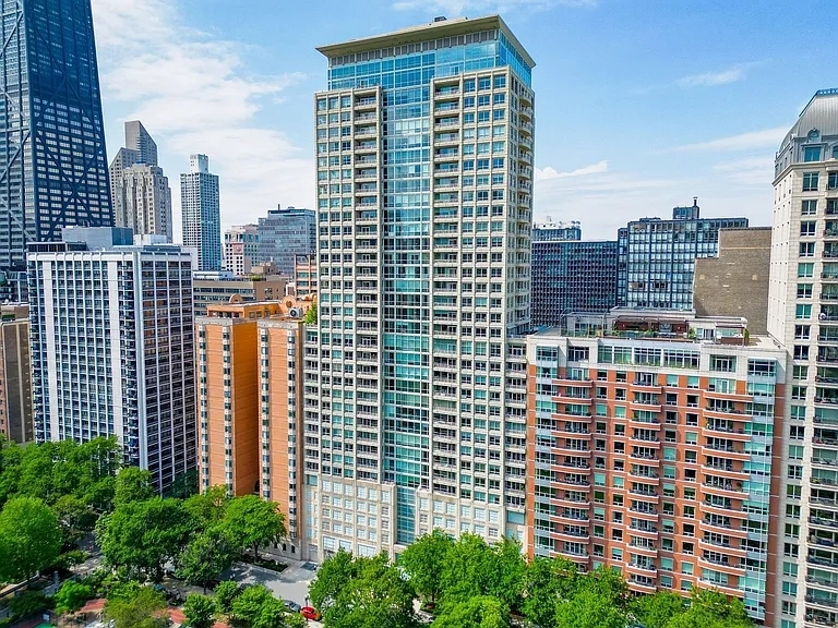 RARELY AVAILABLE CORNER UNIT with FLOOR-TO-CEILING WINDOWS framing stunning views of LAKE MICHIGAN, NAVY PIER, and LAKE SHORE PARK. This 1,900 SQ FT 2 BED / 2.1 BATH home at THE PEARSON offers an expansive open layout flooded with NATURAL LIGHT.    Beautifully finished with HARDWOOD FLOORS throughout, GRANITE COUNTERS, STAINLESS STEEL APPLIANCES, and upgraded cabinetry. Spacious living/dining area ideal for entertaining. Oversized PRIMARY SUITE features a WALK-IN CLOSET, a soaking tub, and DOUBLE VANITY. Enjoy IN-UNIT LAUNDRY!    Full-amenity building with 24-HOUR DOOR STAFF, FITNESS CENTER, ROOFTOP SUNDECK, PARTY ROOM, BIKE STORAGE, and on-site management. Steps from the LAKEFRONT TRAIL, MCA, and all the best of STREETERVILLE.    Assessment includes HEAT, A/C, CABLE & INTERNET.    TWO DEEDED PARKING SPOTS Available for $25k each!