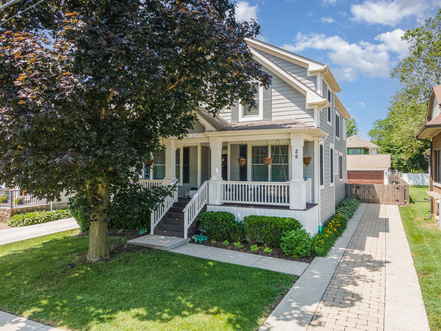 Step into luxury and convenience at 26 S Chestnut Ave, Arlington Heights-where every comfort and convenience is at your fingertips. This stunning, custom-built home is just a one-minute walk from vibrant downtown Arlington Heights, putting shopping, dining, entertainment, and the Metra train right outside your door. This 4-bedroom, 4.5 bathroom masterpiece boasts a sprawling open-concept layout with a chef's kitchen featuring handcrafted cabinetry, quartz countertops, and professional-grade appliances (WOLF). The finished lower level is a true entertainer's dream, featuring a home gym for your wellness routine and a basement bar for hosting friends and family. Upstairs, the lavish primary suite with a walk-in closet and spa-like bathroom offers a private retreat. Step outside to your brand-new backyard oasis, complete with a pergola for dining and relaxation. The large, beautifully landscaped yard is perfect for gatherings, play, or simply unwinding under the stars. The three-car heated garage ensures your vehicles are protected year-round. UPDATES INCLUDE:  Basement bar (complete with sink/plumbing), exercise room mirror, window treatments, carpet to the main floor stairs, French doors for the office, redesigned mudroom and renovated main floor bathroom (within the last two months), garage overhead storage, landscaping bricks and stones, driveway gate, and last summer/fall extended and rebuilt the deck with composite (3x the size) and added the pergola that is remote controlled and also automatically shuts with any rain.
