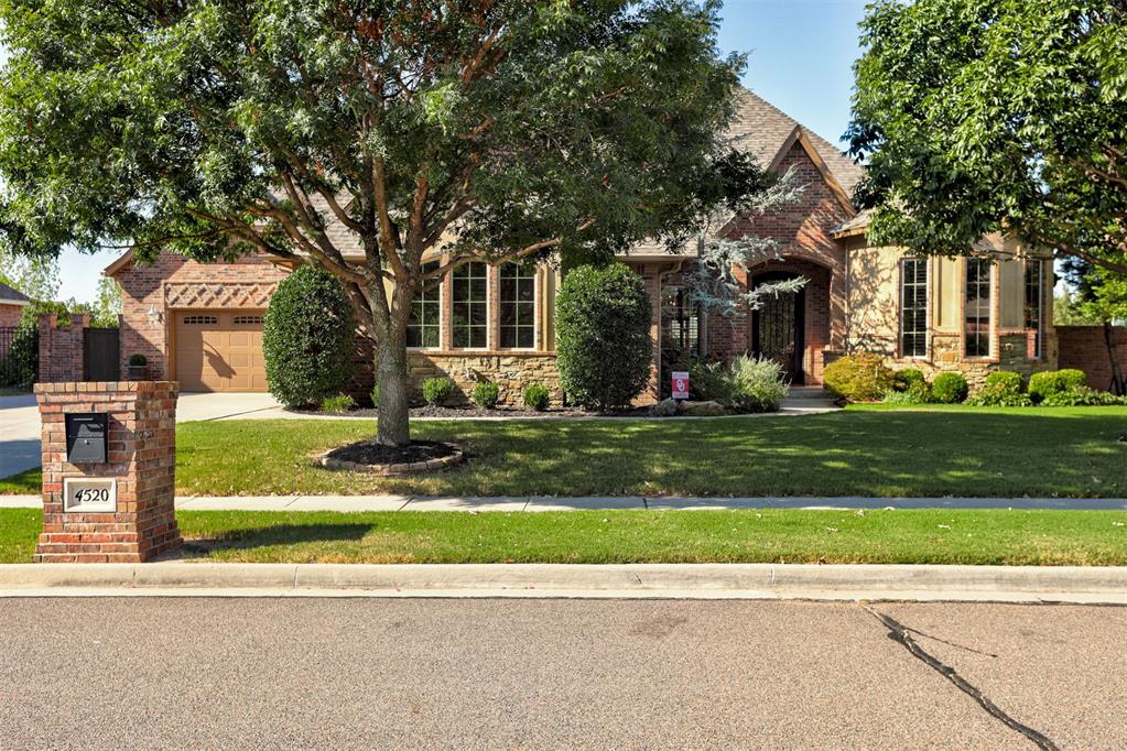 Set on a quiet interior street in the highly sought-after Carrington Lakes neighborhood, this exceptional home offers an inviting blend of refined finishes and thoughtful design. Featuring 4 bedrooms, 5 and a half bathrooms, and a stunning pool and spa, this home is designed for both everyday living and effortless entertaining.A welcoming entry opens to the formal dining area and expansive living room, where a beautiful stone fireplace creates an impressive focal point. The open-concept design seamlessly connects the living spaces, making it ideal for entertaining. The beautifully appointed kitchen features an oversized island, granite countertops, walk-in pantry, and breakfast nook.The primary suite is tucked away at the back of the home and overlooks the pool, creating a peaceful retreat. The spacious en-suite bathroom features a soaking tub, double vanities, and large shower, while the oversized primary closet offers exceptional storage and convenient access to the laundry room.Three additional bedrooms and two full bathrooms are located downstairs, along with a dedicated office featuring beautiful built-ins and a distinctive copper-look vaulted ceiling.Upstairs, a versatile flex space offers endless possibilities and is currently utilized as an additional bedroom. The space includes a private full bathroom and walk-in closet with custom shelving. Two walk-out attic spaces provide additional storage.The beautifully designed outdoor retreat features a resort-style pool and spa, along with an oversized covered patio that creates the perfect setting for outdoor dining, entertaining, or simply relaxing.Thoughtful amenities throughout the home include a whole-home generator, storm shelter, central vacuum system, three-piece crown molding, extensive storage, 855 sq ft of garage space, and home security system with exterior cameras. Recent improvements include new downstairs interior paint, a new roof, and a new wood fence.