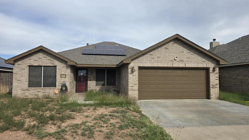 Checkout this awesome 3 bedroom 2 bath home, tile & carpet throughout. Huge walk  in shower in master. Great open concept kitchen with Fireplace. Solar panels will be paid off at closing. Great bonus buy on this home