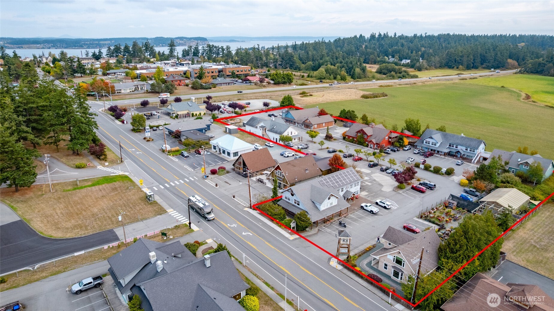 Perfectly situated in the heart of downtown Coupeville with prime exposure near State Route, this superior commercial complex offers over 28,000 sq. ft. of space and 30 unique units, currently home to 25 businesses. Built between 2001–2005, the property boasts a strong rental history, several long-term tenants, and an attractive cap rate. Currently self-managed, it presents an exceptional investment opportunity for any portfolio. Just minutes from the county seat, hospital district, and historic downtown, this is a rare chance to own a high-performing property in a thriving location you won’t want to miss!
