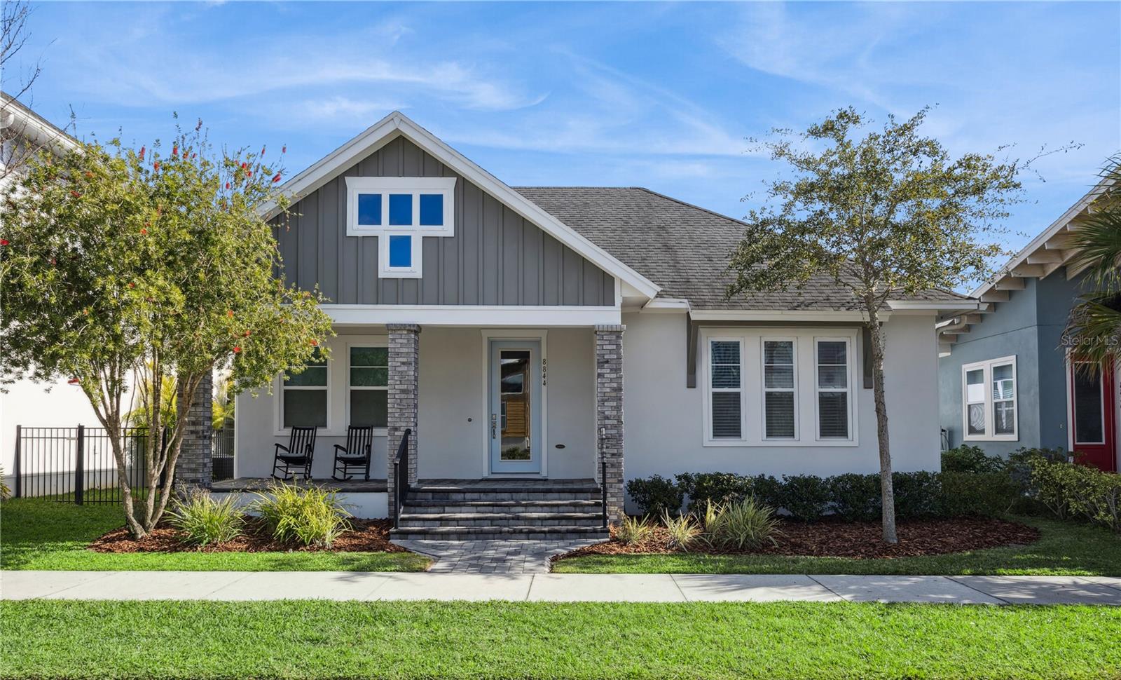 Welcome to this pristine single-family home located in the heart of Laureate Park at Lake Nona. This beautifully maintained residence offers three bedrooms, three full bathrooms, a private office, and a three-car garage, combining modern design with exceptional functionality and an outstanding lifestyle.The open, light-filled floor plan features luxury vinyl plank flooring in the main living areas, high ceilings, and decorative tray ceilings in both the family room and primary suite. The kitchen is designed for both beauty and function with quartz countertops, GE stainless steel appliances, a subway tile backsplash with decorative hood, a walk-in pantry, and an oversized island that opens seamlessly to the family room.The primary suite is a relaxing retreat featuring an oversized walk-in shower with an additional rain shower head, dual quartz vanities, and a spacious walk-in closet. Bedroom three is en suite with its own full bathroom and walk-in closet, ideal for guests or multigenerational living. The private office is located just off the entry and features double glass doors.Outdoor living is enhanced by a large covered brick paver patio offering ample space for entertaining or relaxing. Additional highlights include a hybrid electric water heater for energy efficiency.Located just a short walk from the Laureate Park Village Center, residents enjoy exclusive access to the resort-style Aquatic Center, LP Fit fitness center, off-leash dog park, Canvas Restaurant and Market, and community events. Conveniently close to the VA Hospital, Nemours Children’s Hospital, UCF Medical School, and Orlando International Airport.