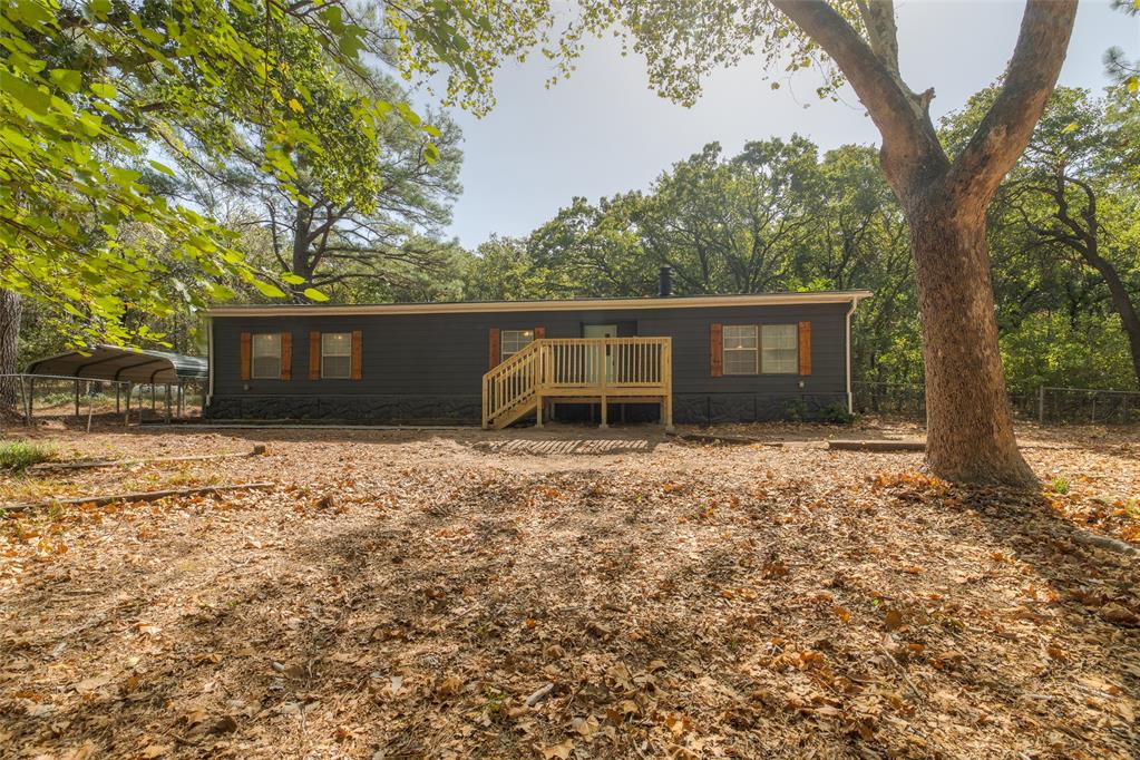 3-bedroom, 2-bathroom home in Norman situated on 2.3 wooded acres, offering plenty of privacy while still being conveniently located near Lake Thunderbird. Recently updated with a new roof, new deck, and remodeled open-concept kitchen, the property also features a spacious circle driveway and a peaceful, private setting. Buyer to verify schools, sqft, etc. Seller/Broker