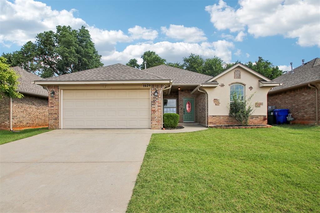 Welcome to 1629 Rangeline Road in Norman — a charming and well-maintained 3-bedroom, 2-bathroom home. This home features an open-concept layout with a split-bedroom floor plan that offers both privacy and practicality. The spacious living room is highlighted by vaulted ceilings, a cozy gas-log fireplace with a custom mantle, and arched entryways that create a warm, inviting feel.

The kitchen is a true standout with granite countertops, stainless steel appliances, a gas range, and a two-tiered bar perfect for casual meals or entertaining guests. The adjacent dining space includes a charming window seat, and the durable wood-look laminate flooring adds a touch of modern flair throughout the main living areas.

The private primary suite includes a large walk-in closet, dual sinks, and plenty of natural light. Step outside to a covered patio and a beautifully terraced backyard with elevated views — an ideal spot for hosting friends or simply enjoying a peaceful evening. Practical upgrades include a storm shelter in the garage, French drain installed 2023, shared fences on sides cedar with metal post installed 2023, brand a new roof in 2021, new hot water heater, fresh paint, and a freshly updated backyard (Bermuda and Fescue, sun deck, new concrete patio).

Located just minutes from local parks, playgrounds, and a serene lake, with easy access to the University of Oklahoma and Tinker Air Force Base, this home offers a fantastic opportunity to enjoy the best of Norman living. Whether you're a first-time buyer, relocating, or looking to invest, this home is move-in ready and full of potential. Schedule your private showing today!