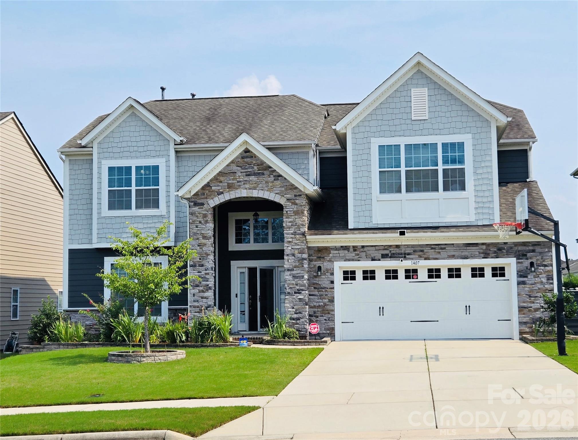 Located in the highly sought-after Brookvue neighborhood in Cabarrus County, this stunning home is zoned for top-rated schools: W.R. Odell Elementary, Harris Road Middle, and Cox Mill High. Conveniently situated just minutes from shopping, dining, entertainment, and major highways (I-85, I-485, and I-77), this home offers both comfort and accessibility.This spacious 4-bedroom, 3-full-bath home with a 2-car garage features an open and functional floor plan with a dramatic two-story foyer and a flexible dining room or home office with full home hardwood flooring. The main level includes a convenient guest bedroom and full bath, perfect for visitors or multi-generational living.The gourmet kitchen is designed to impress with elegant countertops, a large walk-in pantry, a gas cooktop with an externally vented hood, stainless steel appliances, and custom built-in cabinetry surrounding the TV wall.Upstairs, you'll find a spacious loft, three generously sized bedrooms, and a luxurious primary suite featuring a tray ceiling, custom walk-in closets, dual granite vanities, a deep soaking tub, and a separate tiled shower with a built-in bench. Step outside to enjoy the level backyard complete with a gazebo and seating area ideal for relaxing or entertaining. Community amenities include a resort-style swimming pool, playgrounds, and a volleyball court. Refrigerator, washer, and dryer are included, making this home truly move-in ready!