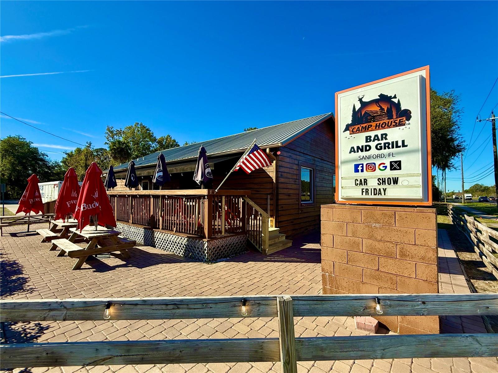 Located right off SR 46 in Sanford near i4. Rare opportunity to acquire a staple of the Sanford hospitality scene with this comprehensive turnkey offering. This sale includes the fully licensed and operating business known as the Camp House Bar and Grill, the prime real estate, and all Furniture, Fixtures, and Equipment (FF&E). Perfectly positioned on a high-visibility corridor with heavy daily traffic counts, the property features a .24-acre lot with favorable PD zoning and exceptional road frontage. The site is anchored by high-impact, lit pole signage, ensuring 24/7 visibility to thousands of daily commuters and local residents. The building’s welcoming and rustic aesthetic provides a versatile environment that can accommodate a variety of concepts or continued growth of the current brand.The business is being sold as a true "plug-and-play" operation, currently run by a manager/operator with a dedicated staff in place who are willing to stay on, providing a seamless transition for the new owner. As the seller shifts focus to other ventures, this presents a unique chance for an investor or owner-operator to step into a fully staffed and functional venue without the typical startup delays. Please do not disturb the staff or patrons; all inquiries and showings must be coordinated through the listing broker.