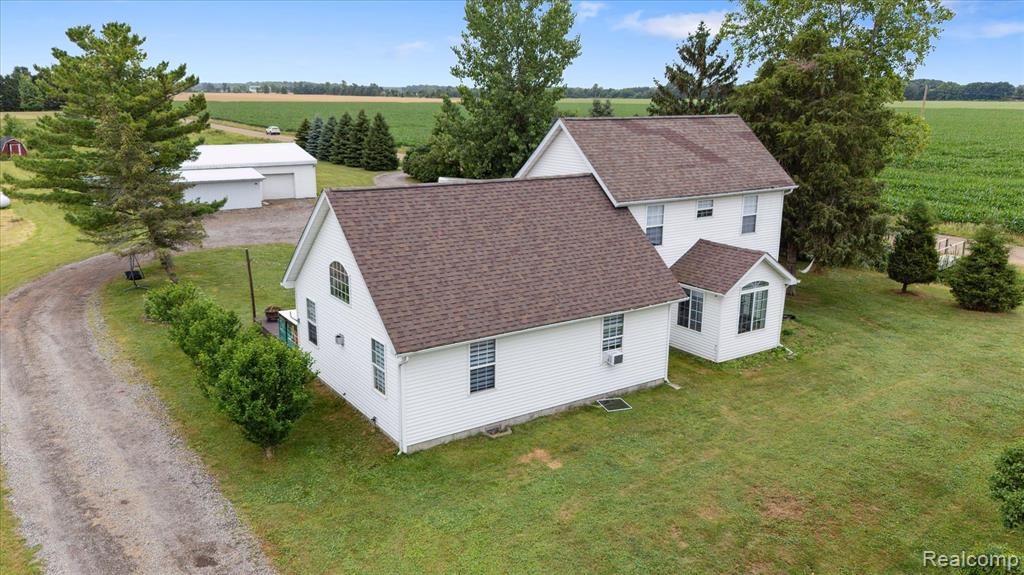 Discover the charm and comfort of this updated 4-bedroom, 2-bath ranch home nestled on just over 4 serene acres in the Owosso area—just 8 minutes from shops, restaurants, and more. With an expansive 2,300 square feet of living space, this home offers room to spread out and relax. Inside, you'll find a warm and inviting layout featuring generously sized bedrooms, a classic kitchen and dining area, and an enormous 900-square-foot living room anchored by a cozy gas fireplace—perfect for chilly Michigan evenings. Recent upgrades include a brand-new roof in 2023 and a new furnace installed in 2024, providing peace of mind for years to come.

Outside, a spacious pole barn/garage of over 1,300 square feet with its own 200-amp electrical service opens the door to endless possibilities—whether you're looking for a workshop, storage, creative studio, or business space. With room to roam, garden, or simply enjoy the peaceful countryside, this home offers the perfect blend of function, freedom, and proximity to everyday conveniences. BATVAI.