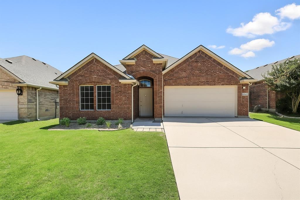 Charming and move-in ready! This home is in the sought-after Country Lakes community in Argyle. This beautifully maintained single-story home offers 3 bedrooms, 2 bathrooms, and a flexible open floor plan ideal for both daily living and entertaining.
The spacious kitchen features ample cabinetry and an island overlooking the bright living area with a cozy fireplace. The private primary suite features dual sinks, a soaking tub, separate shower, and a generous walk-in closet. Two additional bedrooms provide space for guests, family, or a secondary home office. Enjoy your morning coffee or evening gatherings on the back patio with a fully fenced backyard perfect for outdoor living. Country Lakes residents enjoy access to community pools, walking trails, and parks. This home combines comfort, style, and convenience with schools, dining, shopping and major highways just minutes away.