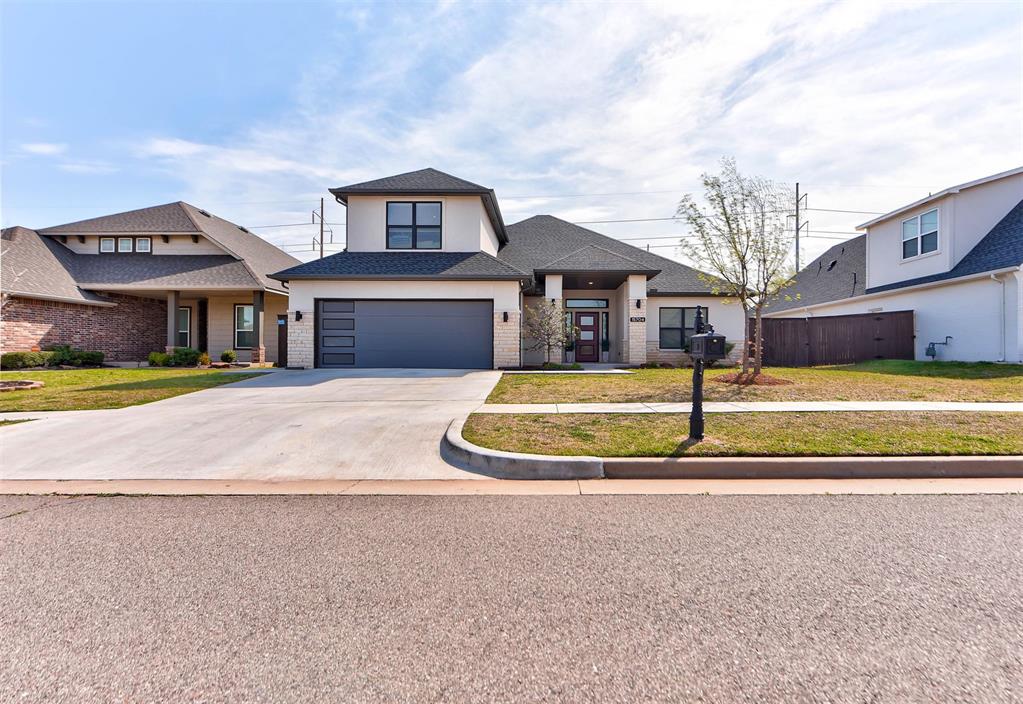 Located in the sought-after Rockwell Park community within the Deer Creek School District, this thoughtfully designed home offers the perfect blend of style, function, and livability. Featuring 2,564sqft, this home includes 4 bedrooms, 3 full bathrooms, and a functional split floorplan. The exterior of the home stands out with its classic stucco exterior paired with a clean, modern design. The heart of the home is the stunning kitchen, complete with built-in appliances, a gas range, an oversized center island with beautiful quartz countertops, and a spacious walk-in pantry. Perfect for both everyday use and hosting guests. The main living areas flow seamlessly, from the kitchen to living room, with great natural light in the space. Great storage and closet space throughout the home. Oversized laundry room with room for a second refrigerator or deep freeze, and drop zone. The master suite features a spacious walk-in shower, soaking tub, and walk-in closet. Upstairs, is a versatile space with a full bathroom and large walk-in closet, ideal for a 4th bedroom, guest suite, or bonus room. One of the standout features of this home is the screened-in back patio, offering 150sqft of additional space, perfect as a second living area for relaxing or entertaining. The patio has also been extended to provide additional space for grilling or even a hot tub setup. A combination of distinct architectural style, modern finishes, and flexible layout, this home offers a rare opportunity in one of the area’s most convenient locations. Great schools and quick access to HWY 74 and the Turnpike!