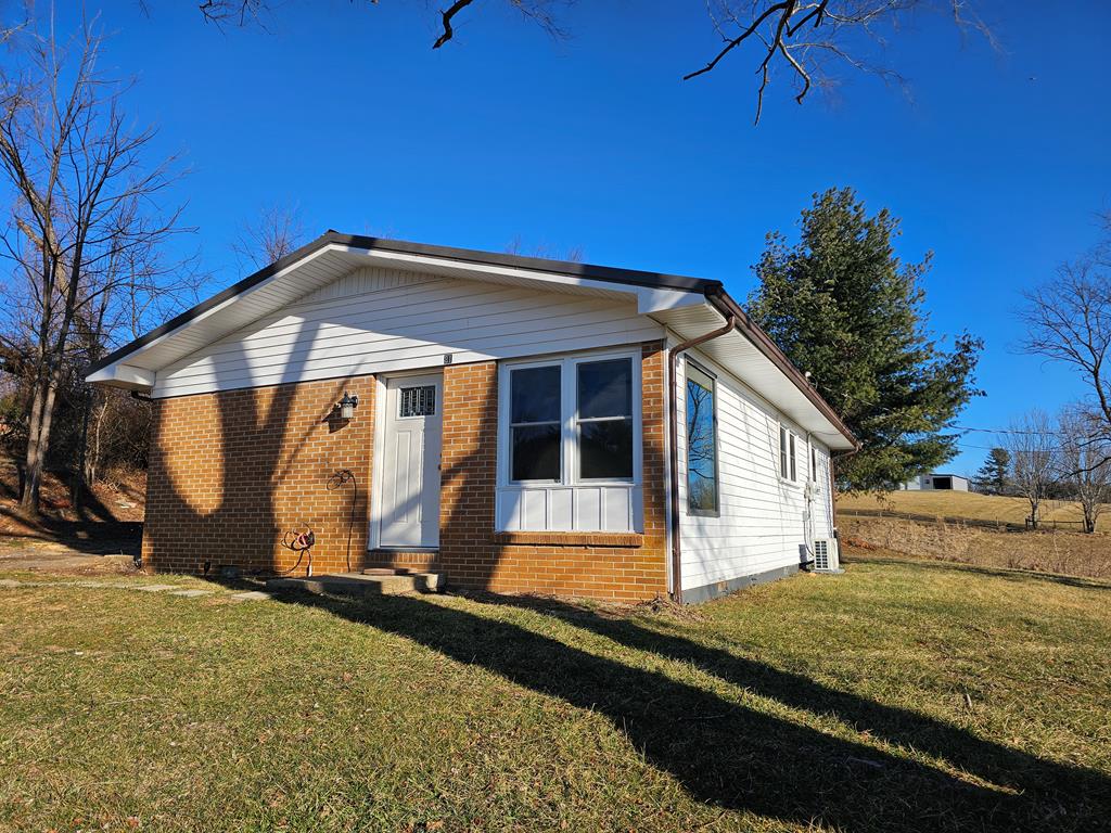This recently remodeled 3-bedroom, 1-bath ranch home is located just outside Galax City in Carroll County and offers comfortable, move-in-ready living with a convenient single-level layout. The home features fresh updates throughout, creating a bright and inviting interior ideal for full-time living or a weekend retreat. Enjoy the perfect blend of peaceful country living and easy access to outdoor recreation, with the New River and New River Trail just minutes away, offering opportunities for kayaking, fishing, biking, and hiking. Convenient to town yet tucked away in a quiet setting, this property is a great opportunity for homeowners or investors alike.